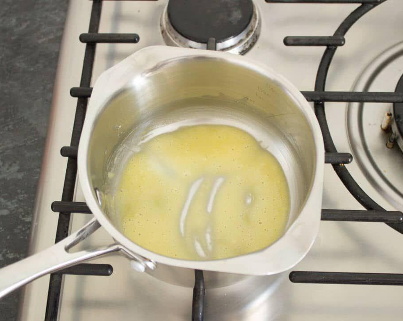 step 3 To make the sauce, melt the Butter (2 tsp) in a saucepan over a low heat then throw in the All-Purpose Flour (1 tsp). Stir constantly over the low heat for 2 minutes.