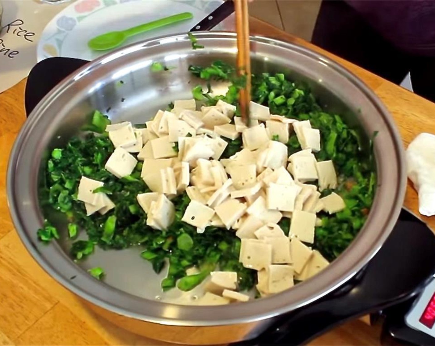 step 4 Mix well, then add the bean curd and Ground White Pepper (1/2 tsp). Stir, then transfer to a plate.