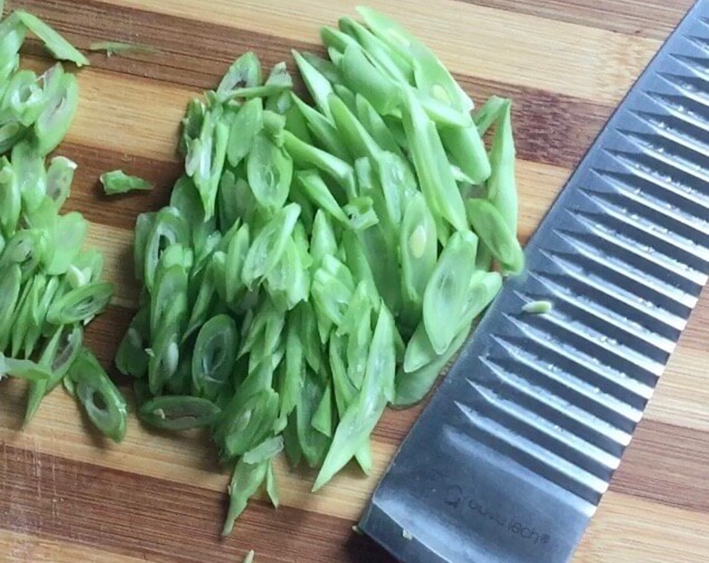 step 22 Shred French Beans (3/4 cup) into long thin strips.