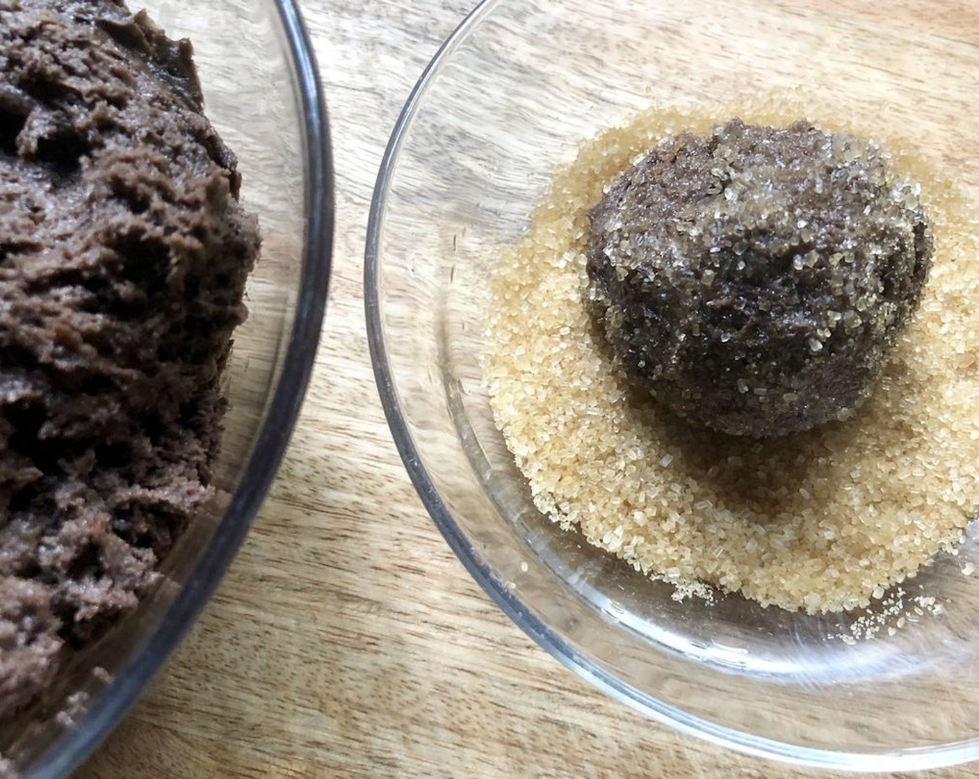 step 6 Divide dough into 8, roll each lump into a ball, and dip in Raw Sugar (4 Tbsp).