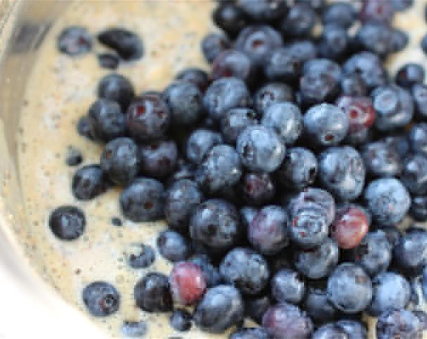 step 5 Add Vanilla Extract (1 tsp), Agave Syrup (1/4 cup), and Canola Oil (2 Tbsp) into the almond milk buttermilk mixture, then mix that into the dry flour mixture. Add in Fresh Blueberries (2 cups) and carefully stir without breaking the blueberries.