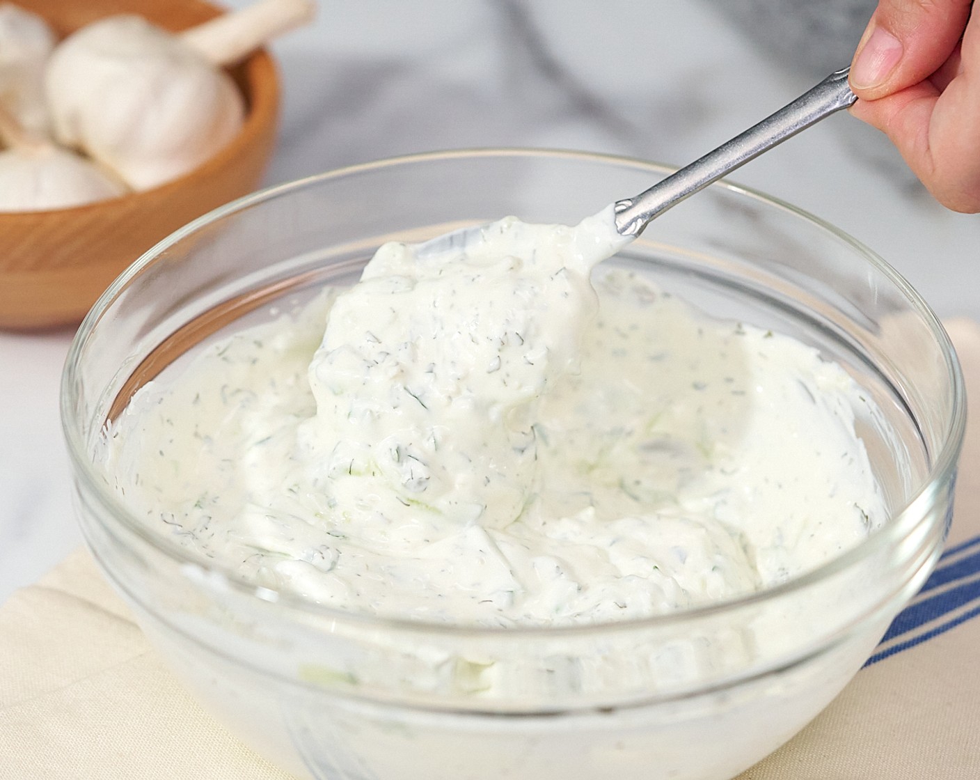 step 6 Add Greek Yogurt (1 cup), Mayonnaise (1/4 cup), 1 Tbsp of Lemon (1), Garlic (2 cloves), Dried Parsley (1 tsp), and Dried Dill Weed (1/2 tsp) to the bowl and stir to combine.