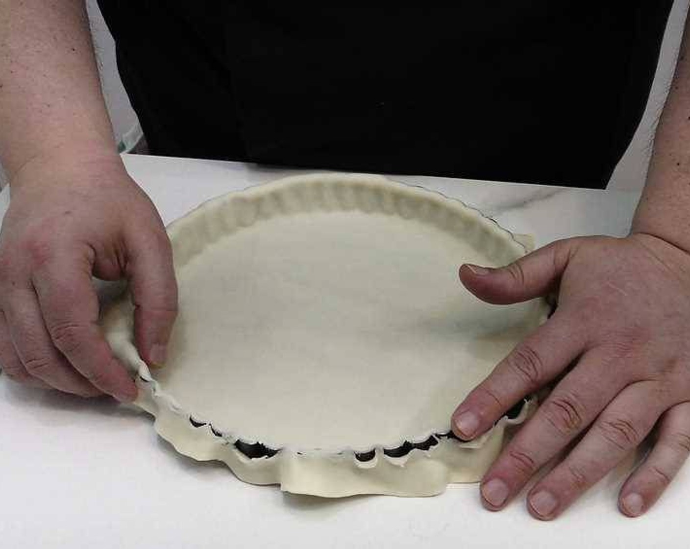 step 1 Spread out the Puff Pastry (1 sheet) over a pie or tart mold and press into the mold. Remove the excess edges of puff pastry by pressing up against the edges of the pan.