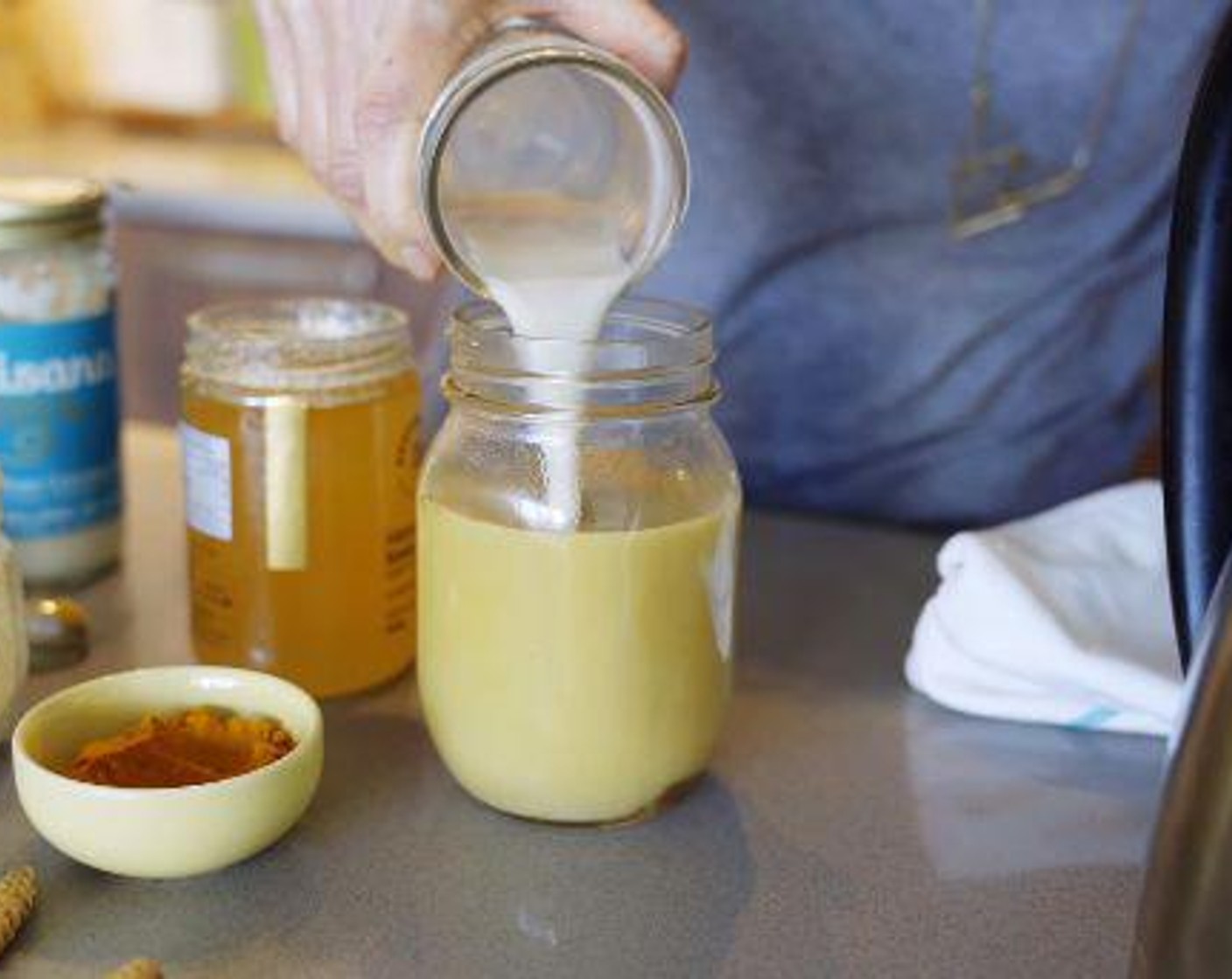 step 2 Boil Filtered Water (1/2 cup) and pour into jar. Then add Nut Milk (1 cup). Allow water to cool slightly before putting on the lid and seal tightly.