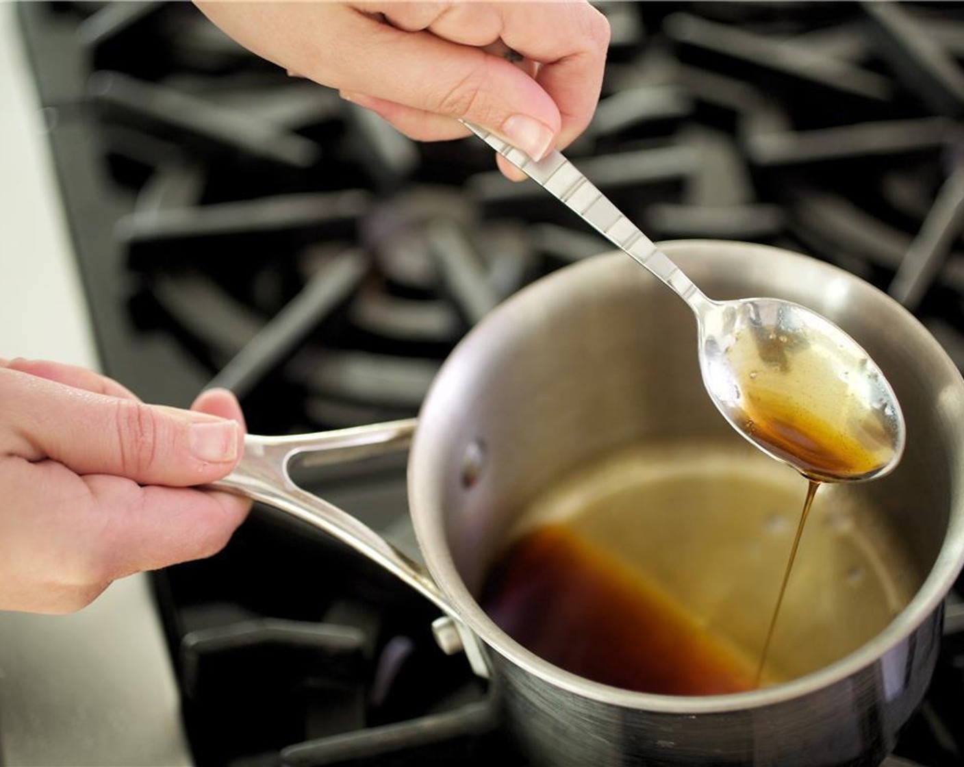 step 2 Bring the Apple Juice (2 cups) to a quick boil in a medium saucepan over medium high heat. Let simmer for 40 minutes or until it is reduced down to a syrup consistency, about a quarter of a cup of liquid.