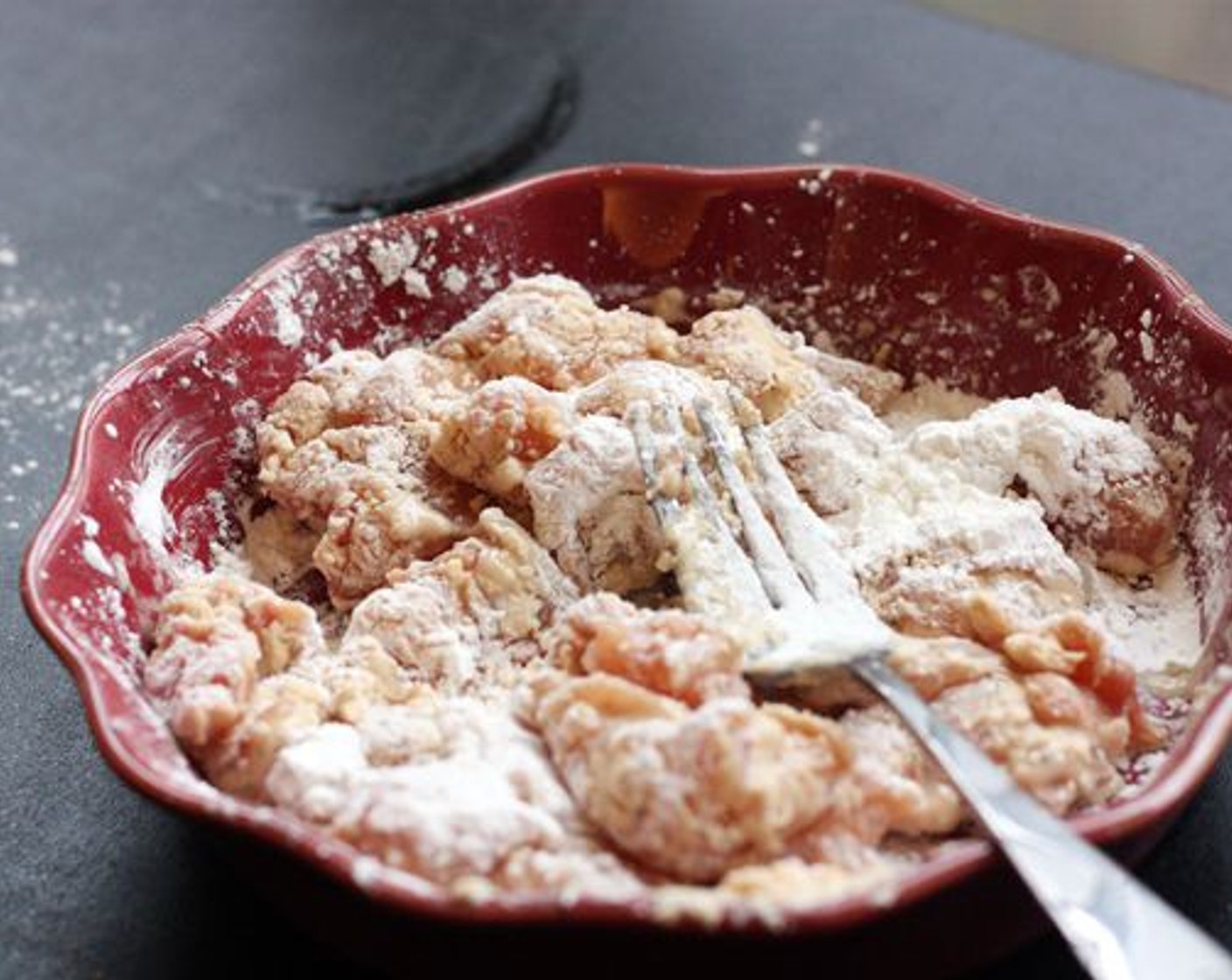 step 5 In a pie plate or other deep plate, mix together Corn Starch (3/4 cup), Salt (1/4 tsp), and Ground Black Pepper (1/4 tsp). Scoop chicken out of the marinade and place in the cornstarch, turning and mixing until all pieces are coated. The mixture will be somewhat sticky.