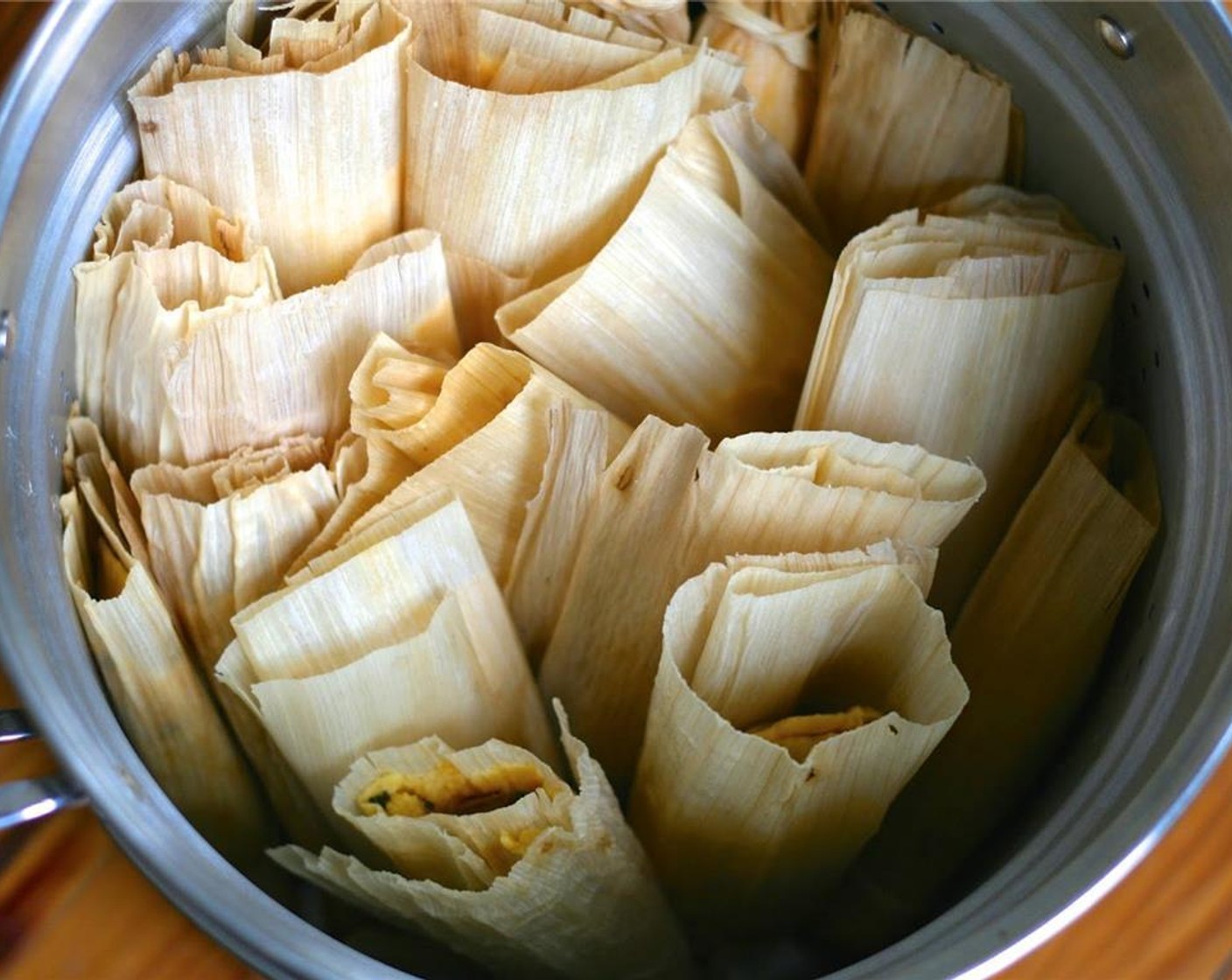 step 11 Place tamales upright in a large steamer basket and steam on the stove for 45 to 60 minutes.