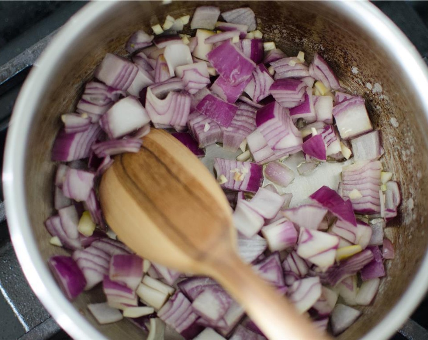 step 3 Place a medium pot over medium heat with 1 tablespoon of olive oil. Add shallot and 1 clove of garlic to pot and saute until softened, about 2-3 minutes.