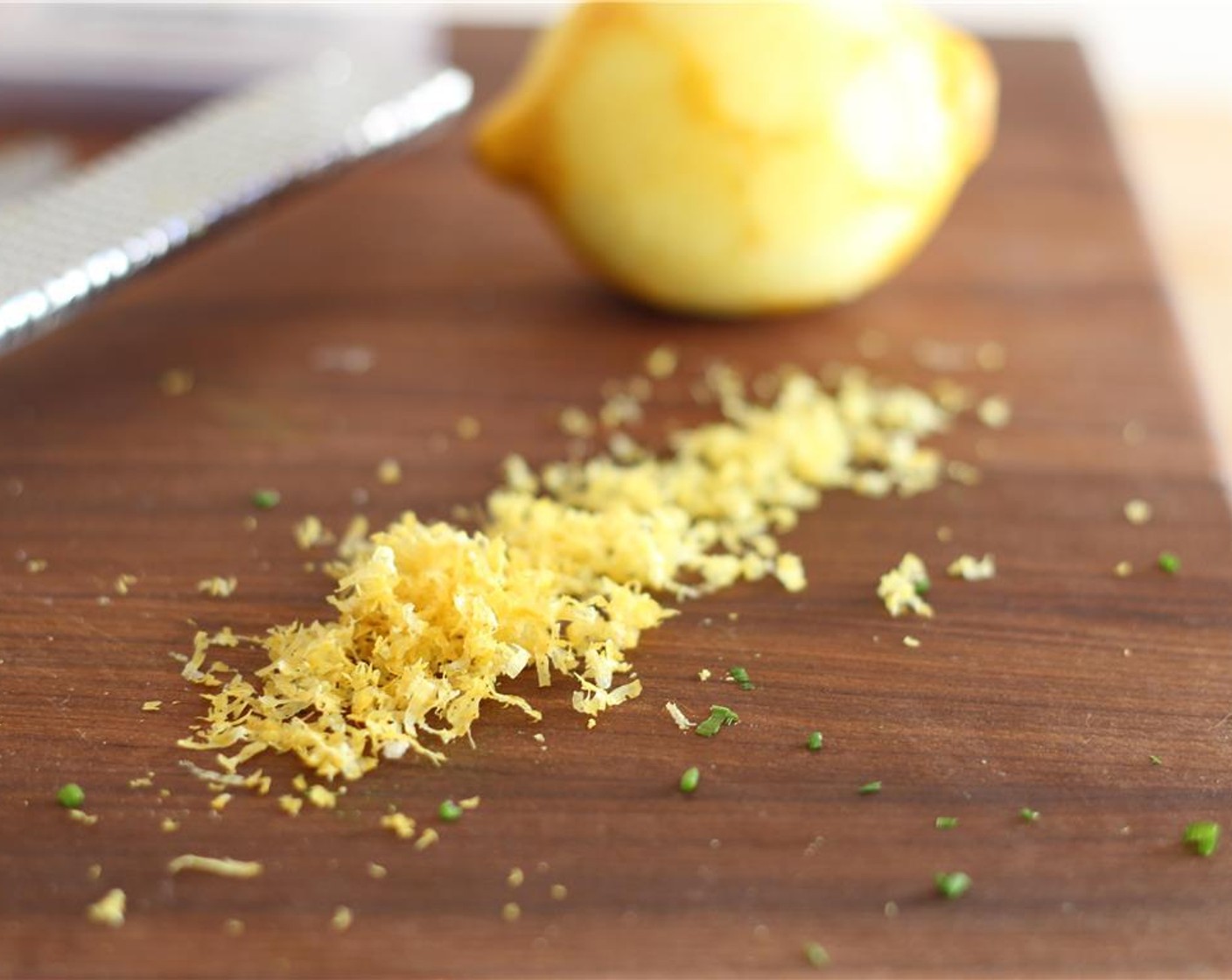 step 7 Zest the Lemon (1/2).