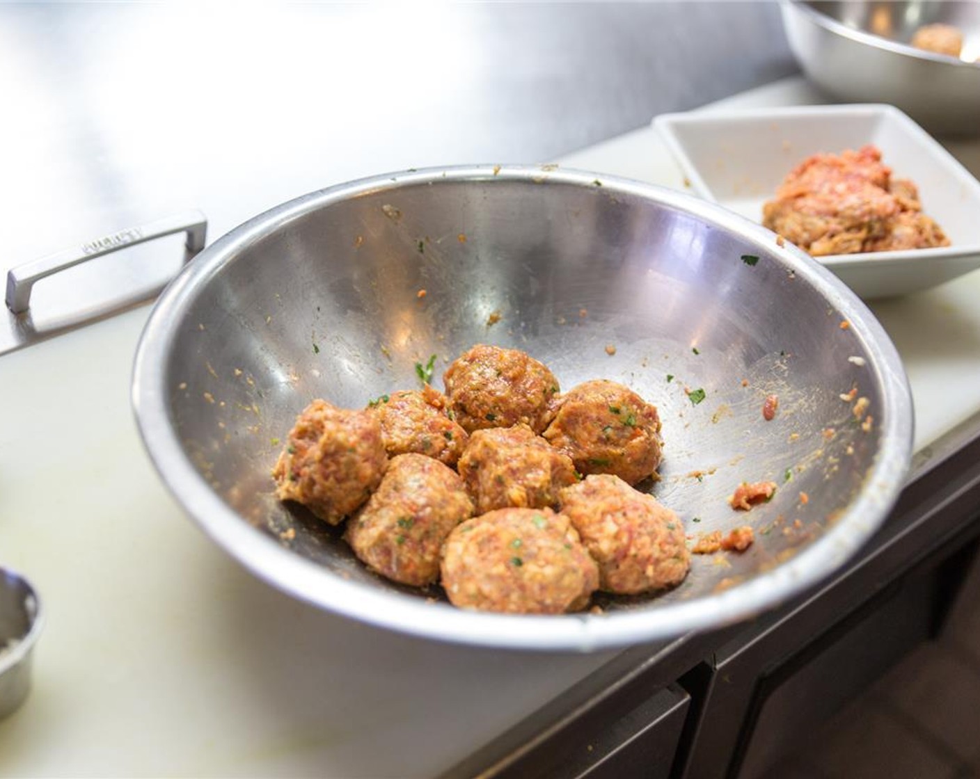 step 4 Refrigerate for 2 hours. Make sure to heat the Canola Oil (as needed) in the fryer to 350 degrees F (180 degrees C), so it is ready when the meatballs are.