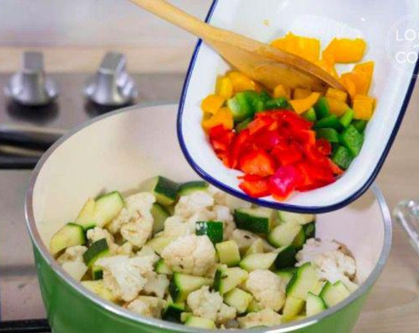 step 3 Add Zucchini (1/2), Cauliflower (1 head), Red Bell Pepper (1/2), Green Bell Pepper (1/2), and Yellow Bell Pepper (1/2).