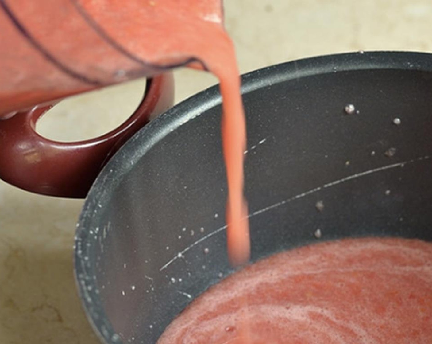 step 1 Blend the Tomatoes (2 1/2 cups) with Water (1 cup). Put blended tomatoes into a pot.