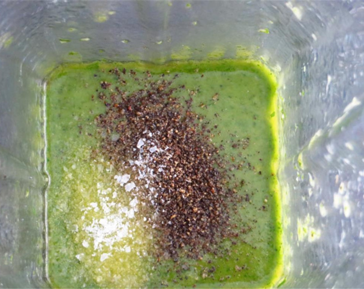 step 3 In a blender, combine the Fresh Cilantro (1 1/2 cups), garlic, Lime (1), Red Wine Vinegar (2 Tbsp), Olive Oil (1/2 cup), Kosher Salt (1/2 tsp), and Ground Black Pepper (1/2 tsp). Puree until smooth. Taste and season as desired.