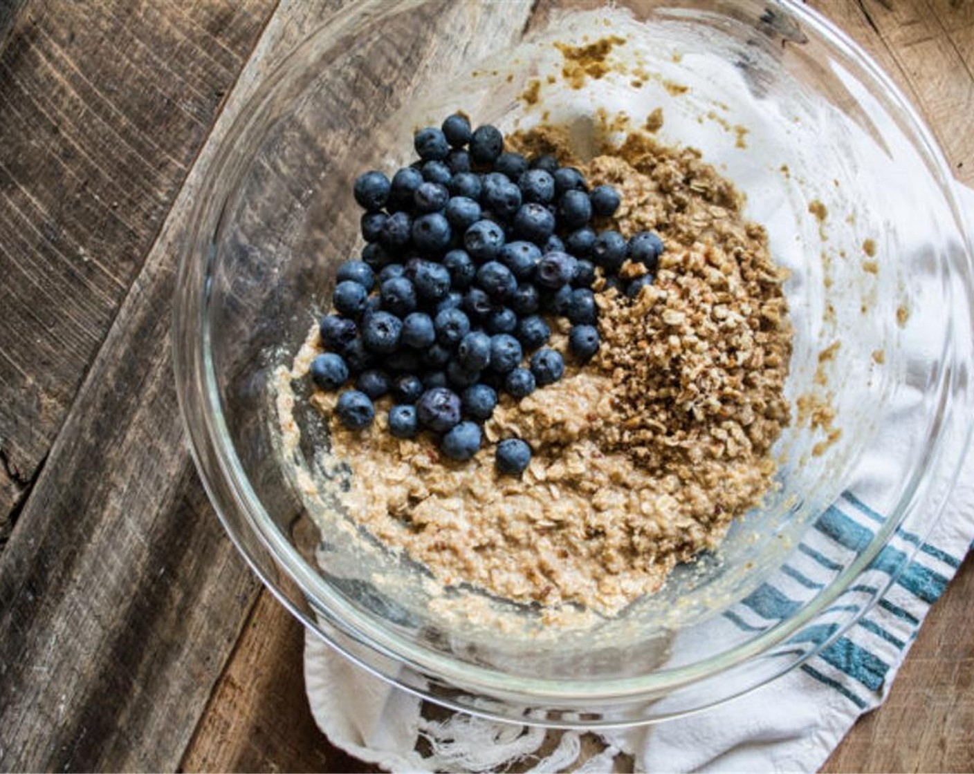 step 6 Add the wet mixture to the large bowl of dry ingredients, then mix until everything is fully incorporated. Fold in Fresh Blueberries (1 1/2 cups) and Chopped Pecans (1/4 cup).