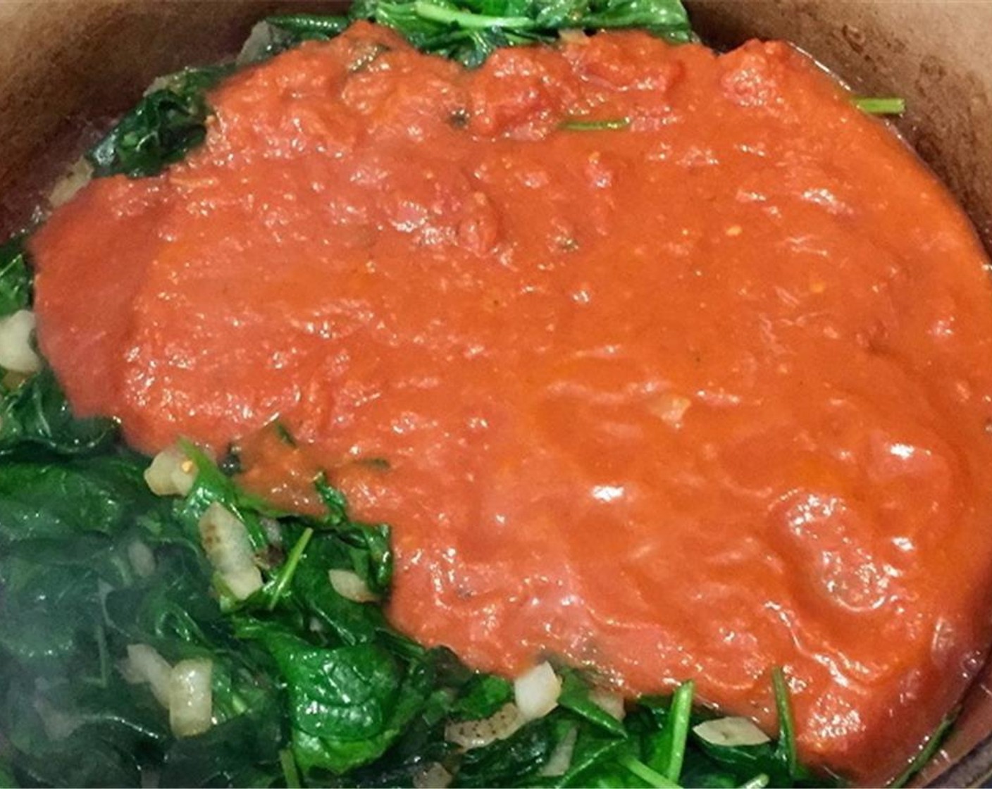 step 4 Cook for a couple of minutes until the spinach is wilted and most of the wine has boiled off. Add Vodka Sauce (1 jar) and bring to a simmer.