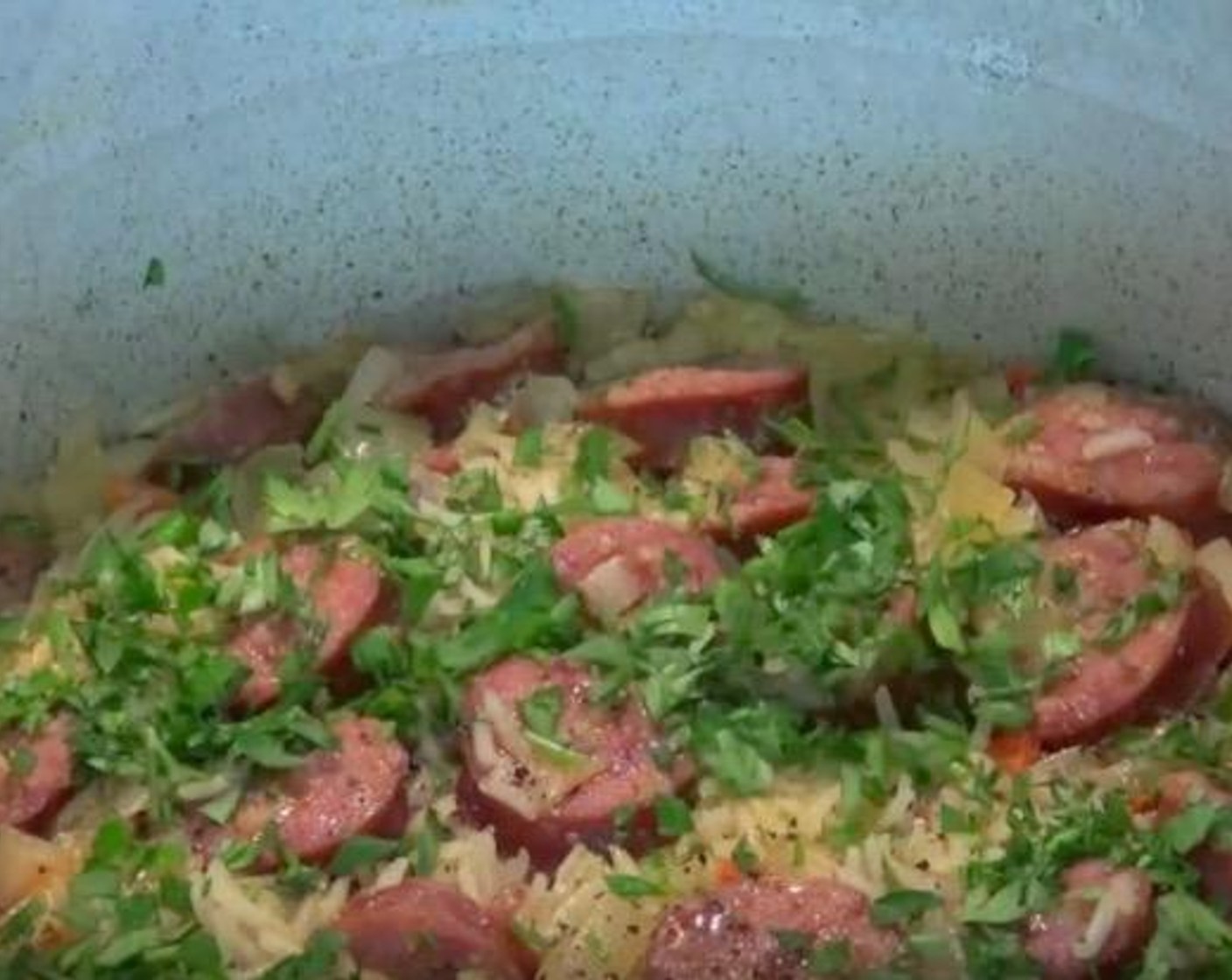 step 2 Then add Basmati Rice (2 cups),stir together and add chorizo again with Chicken Stock (4 cups). Once the mixture is boiling, reduce the heat to medium-low and allow it to simmer with the lid on for 10 minutes. Next take the pot off the stove and leave the lid on, allow it to sit for 5 minutes. Season it with Salt (1 dash), Ground Black Pepper (1 dash), and Fresh Parsley (1/2 cup). Then stir it. Serve and enjoy!