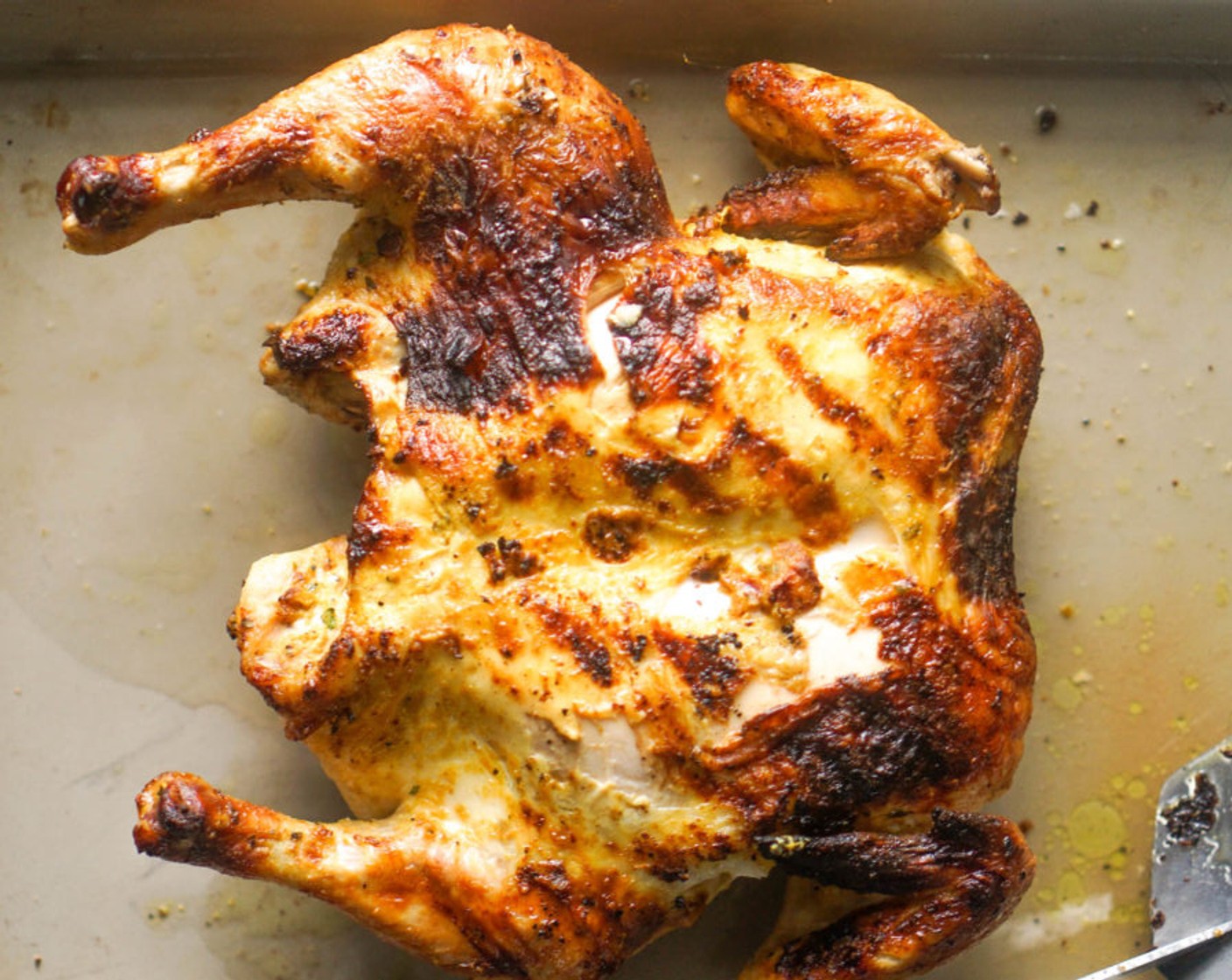 step 10 Take the chicken off of the grill and rest for 10 minutes. Transfer breast side down to the direct side of the grill (over the flame) and allow to char for a few minutes, or until temperature reaches 165 degrees F (74 degrees C).