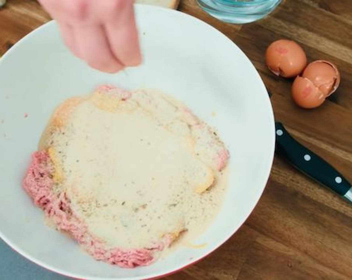 step 10 Next up it’s time for the cheese! Add both the Pecorino Romano Cheese (4 Tbsp) and Parmigiano-Reggiano (4 Tbsp) to the bowl and be sure to take the flavour of these Italian meatballs to a whole new level!