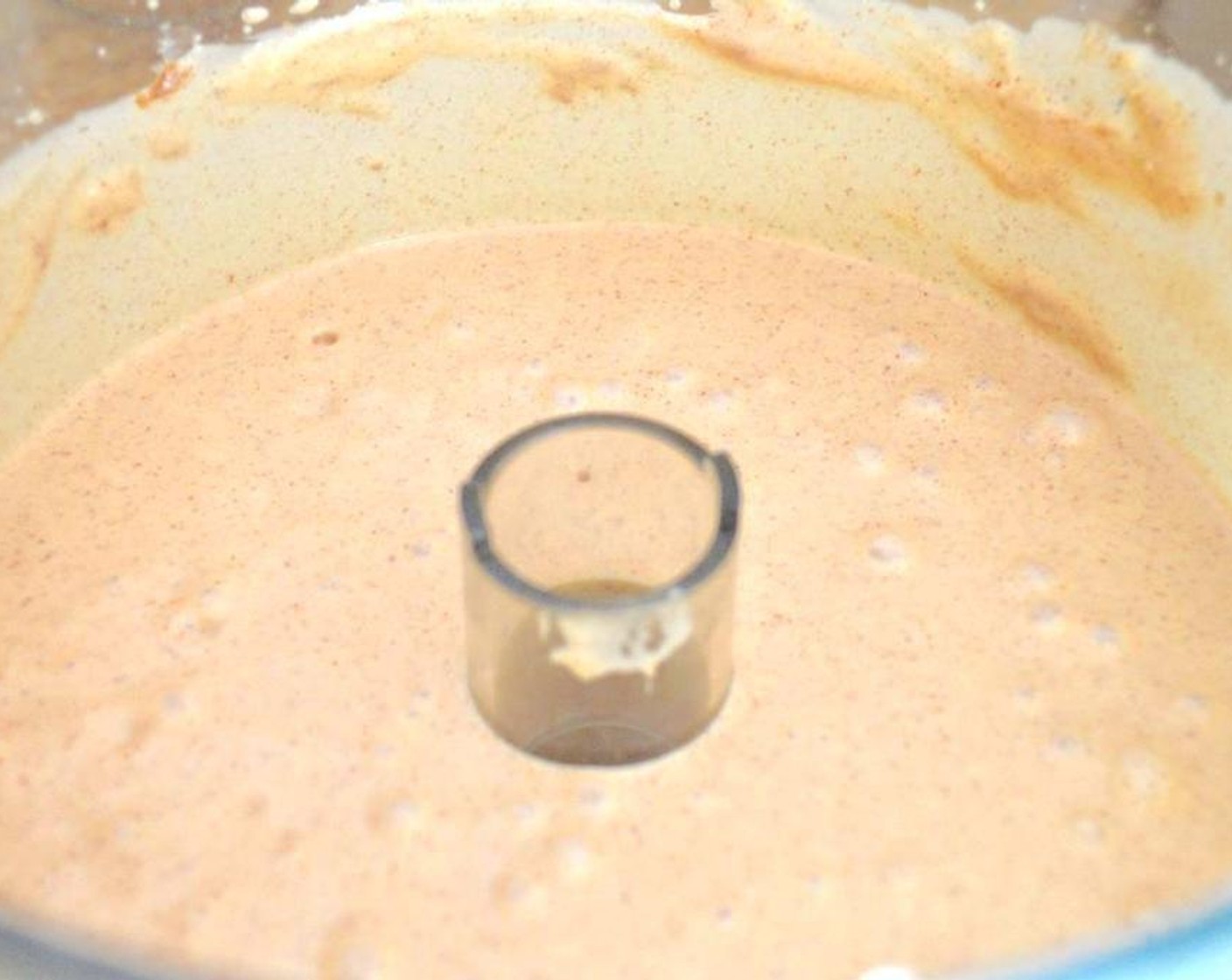 step 1 Set up a food processor and combine Bananas (3), Plain Greek Yogurt (285 g), Almond Butter (160 g), Ground Cinnamon (1/4 tsp), Honey (1 tsp) in its bowl. Puree it all until it is creamy and completely smooth.