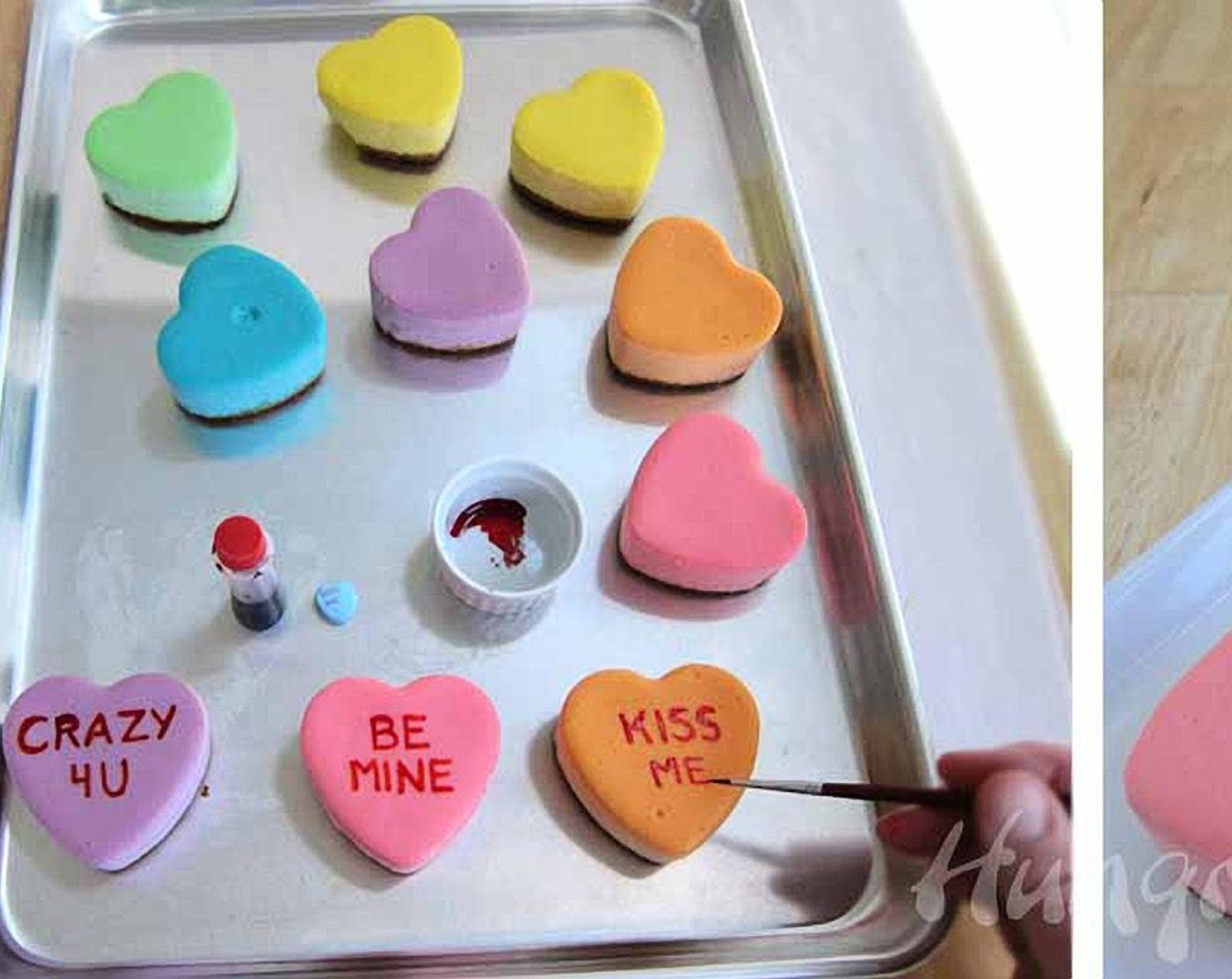 step 13 Squeeze a few drops of red food coloring into a small bowl. Use a fine tip paintbrush to paint conversation heart sayings onto each cheesecake heart.