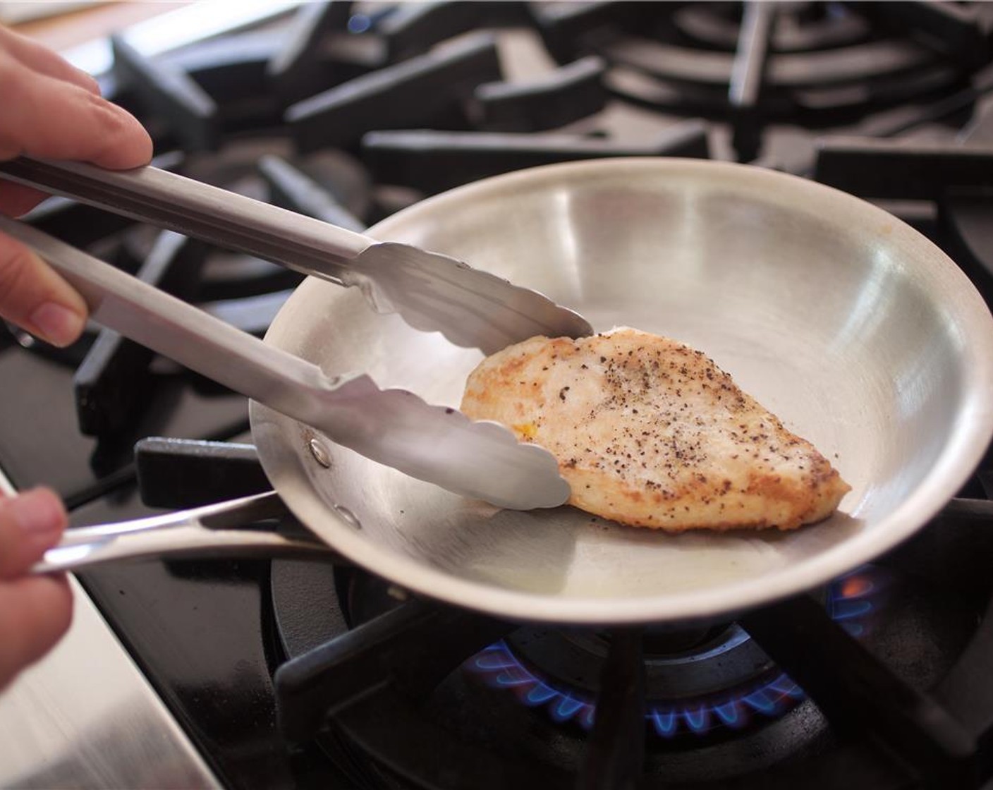 step 7 Heat a large saucepan or Dutch oven over medium high heat with Olive Oil (1 tsp). When the oil is hot, add the chicken and sear on each side for 4 minutes until fully cooked.