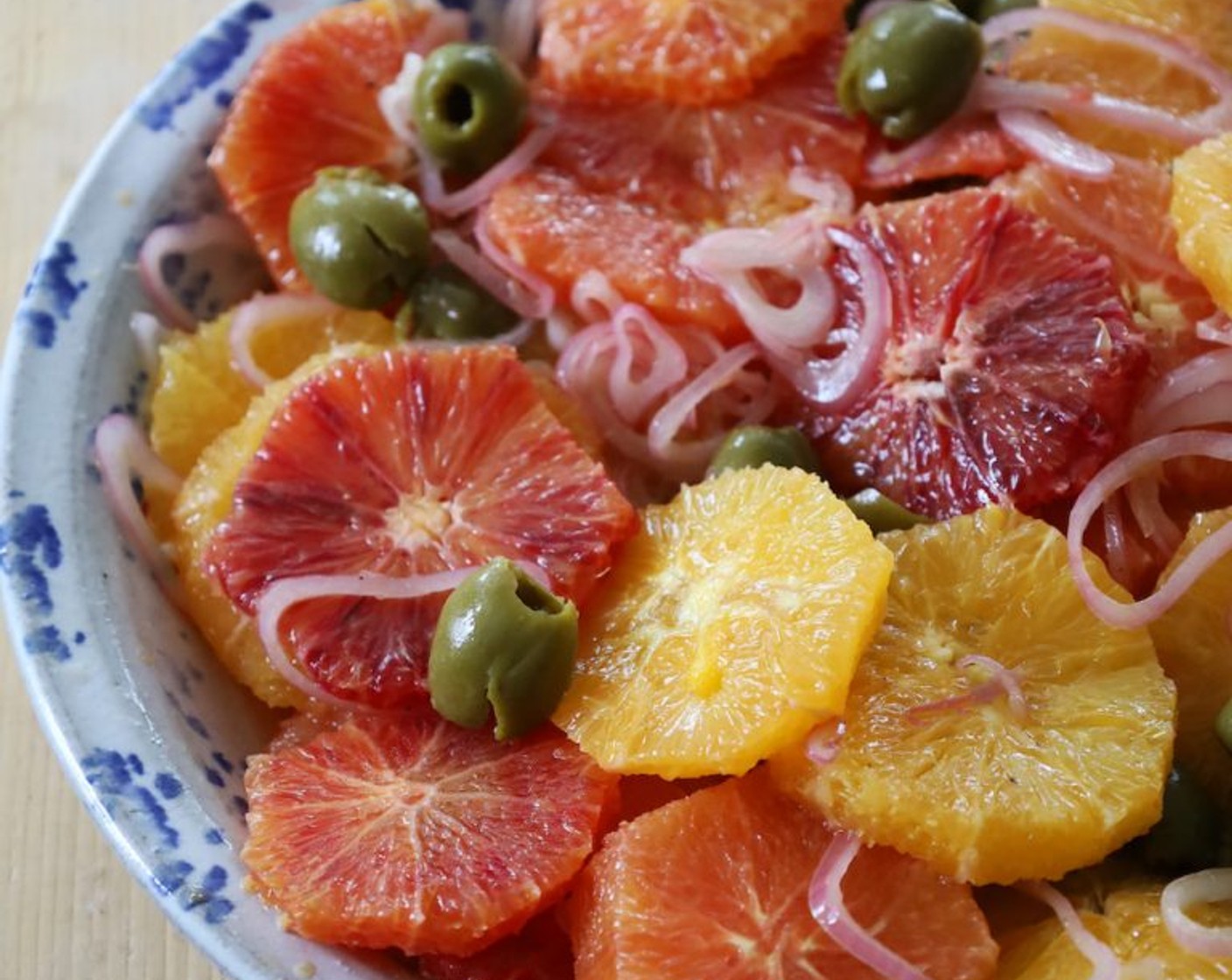 step 5 Add the oranges to the bowl with the shallots. Add the Castelvetrano Olive (3/4 cup), toss gently, and set aside.