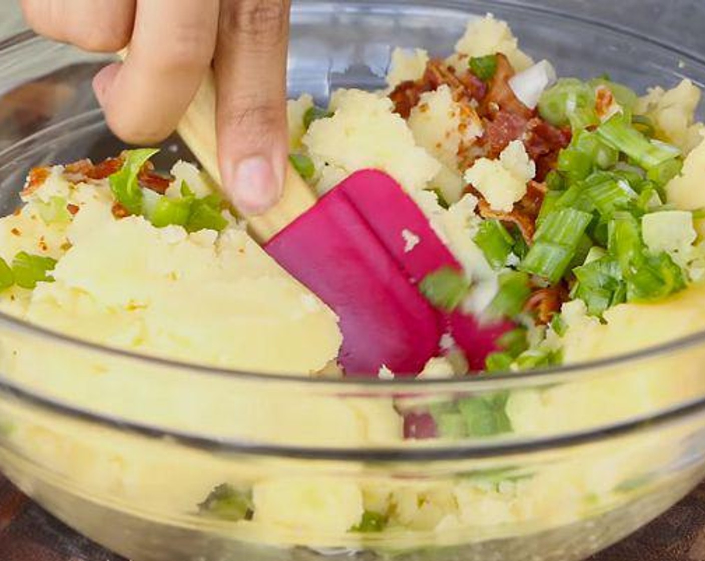 step 2 In a bowl, add Mashed Potatoes (4 cups), Salt (to taste), chopped bacon, Scallion (1/2 cup) and mix together until well incorporated.