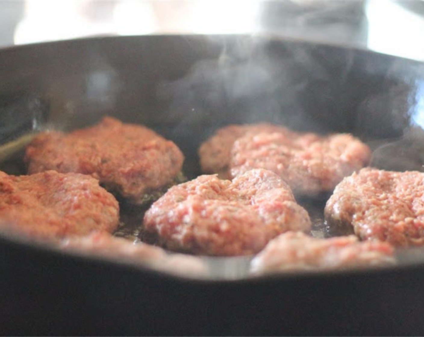 step 4 Add a little more butter or palm oil to a pan over medium high heat because these will want to stick. When hot, add the patties to the pan and cook in batches. Make sure not to crowd the patties.