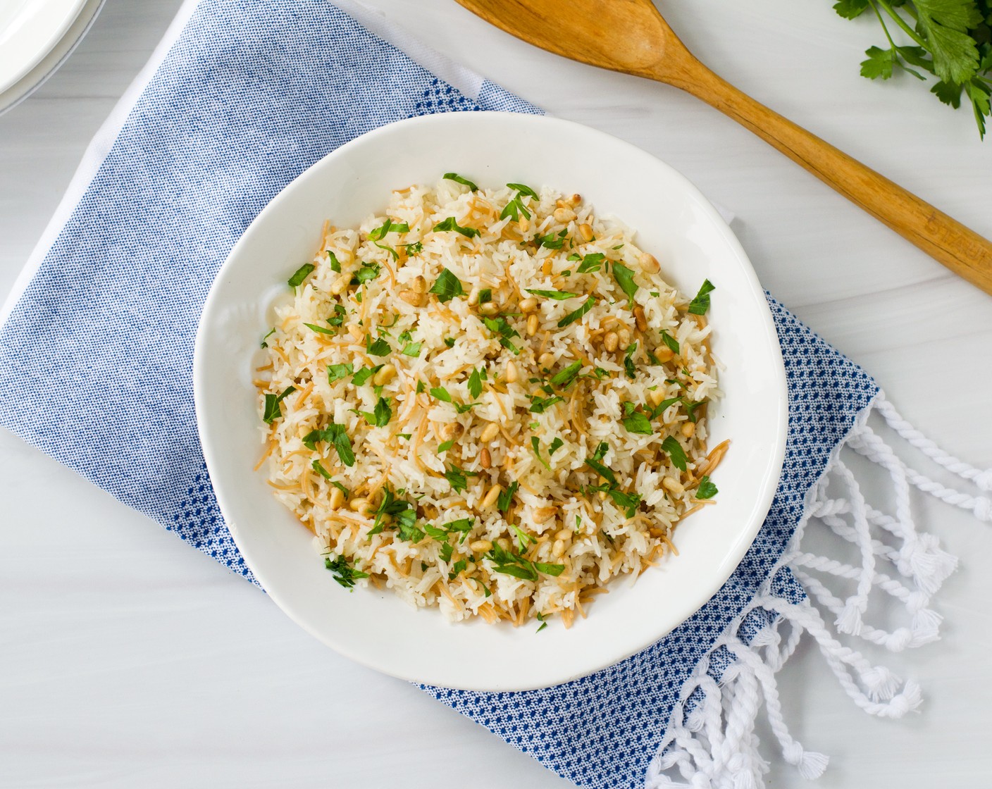 step 5 Stir in the Italian Flat-Leaf Parsley (1/3 cup) and Pine Nuts (4 Tbsp). Serve warm or at room temperature.