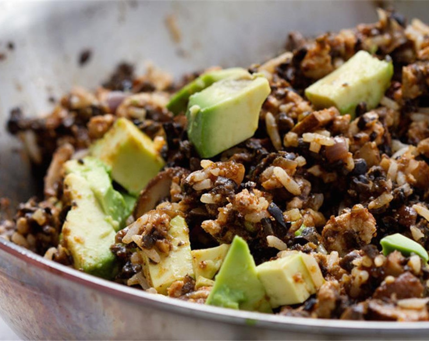 step 6 Add the cooked White Rice (1/3 cup), pork, jalapeño pepper, Tomatillo Salsa (1/2 cup), Black Olives (2 cups), chopped avocado, Fresh Oregano (1/2 Tbsp), Ground Cumin (1/2 Tbsp), Smoked Paprika (1 Tbsp), Chili Powder (1/2 Tbsp), and Ground Coriander (1/2 Tbsp).