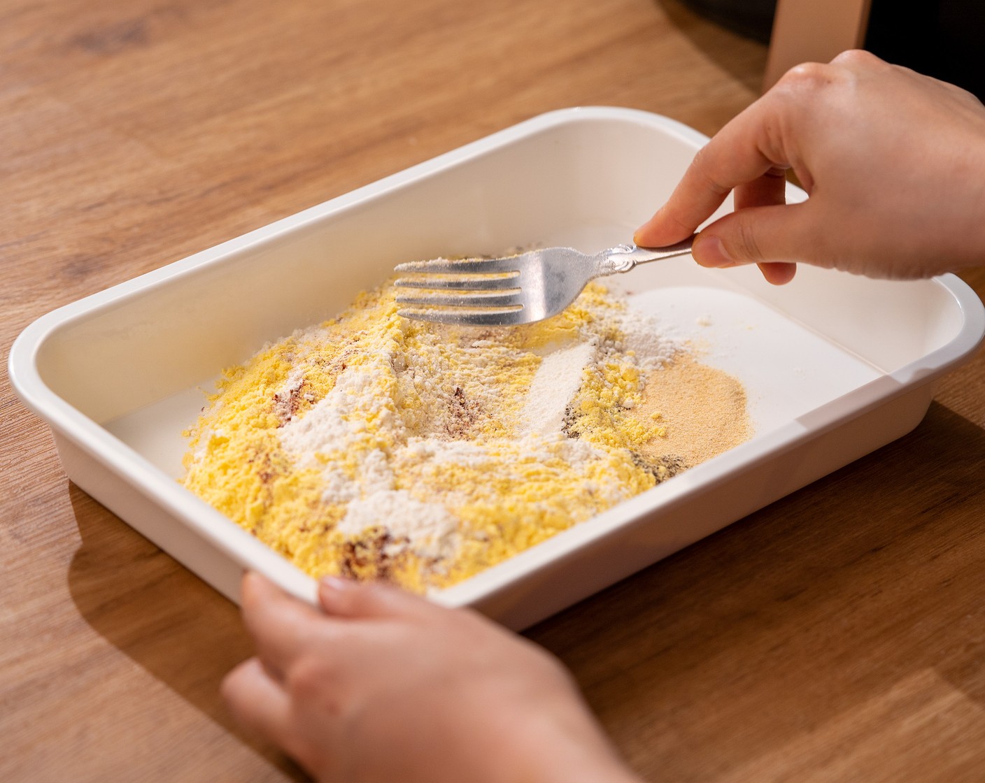 step 2 In a tray, combine the All-Purpose Flour (1/2 cup) and Fine Ground Cornmeal (3/4 cup) with Salt (1 tsp), Ground Black Pepper (1/2 tsp), Smoked Paprika (1 tsp), and Simply Organic Garlic Powder (1 tsp).