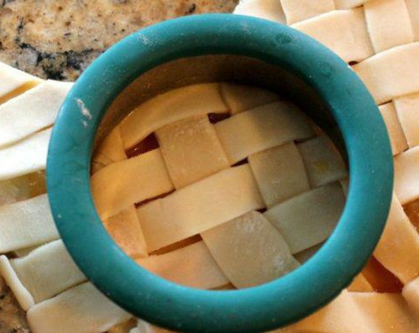 step 5 Create a lattice crust (just like on a pie) for the top of the pie filling. Dip your cookie cutter into some egg wash and cut out your Pie Cookies.