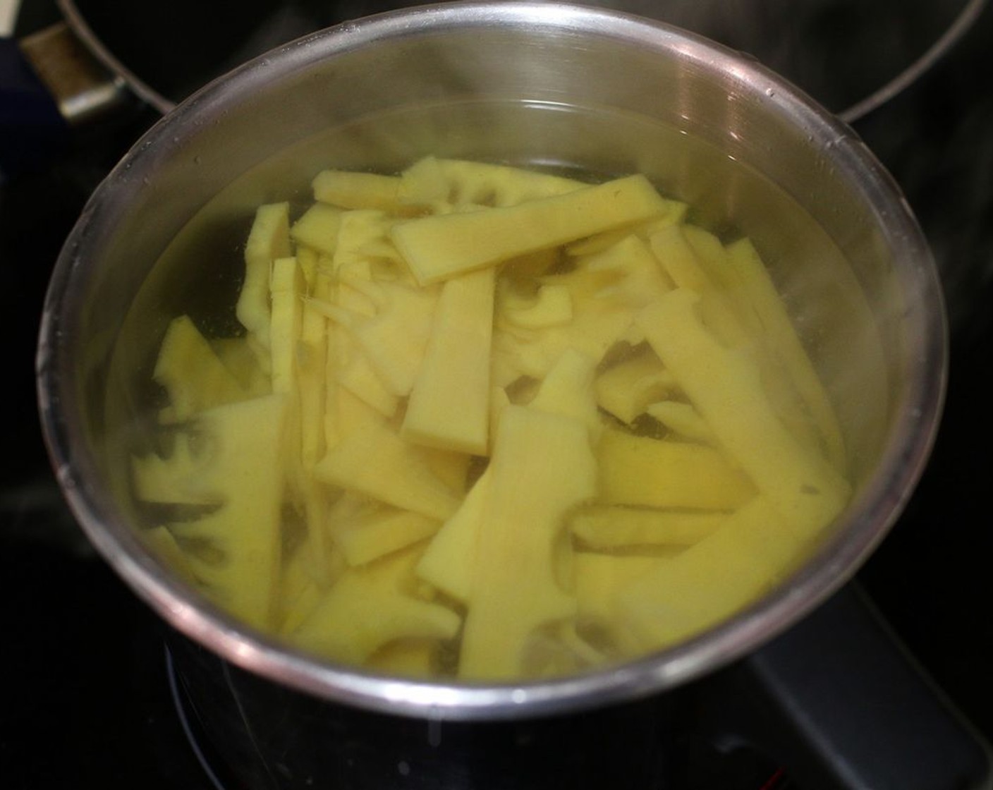 step 1 Boil the Bamboo Shoots (1 can) in hot water for 5 mins, this will take away their unpleasant bitter taste.