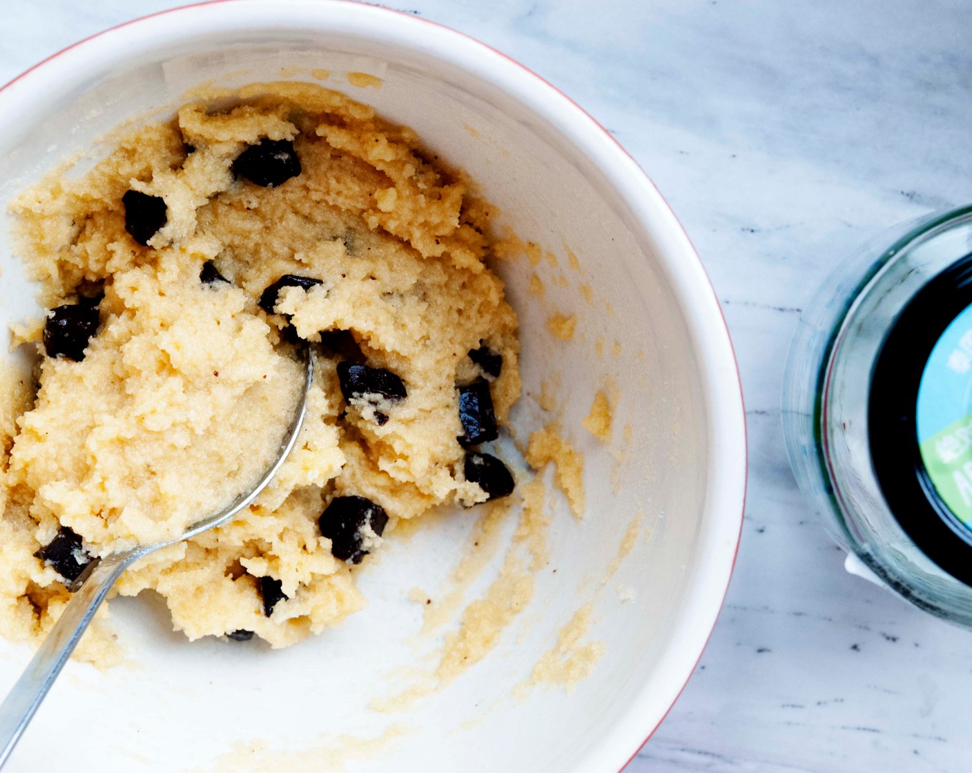 step 3 Add the Almond Flour (2/3 cup), Granulated Erythritol (2 Tbsp), Vanilla Extract (1 tsp), Baking Soda (1/2 tsp), Baking Powder (1/4 tsp), Salt (1 pinch), and Sugar-Free Chocolate Chips (1/3 cup) and mix until a cookie dough forms.