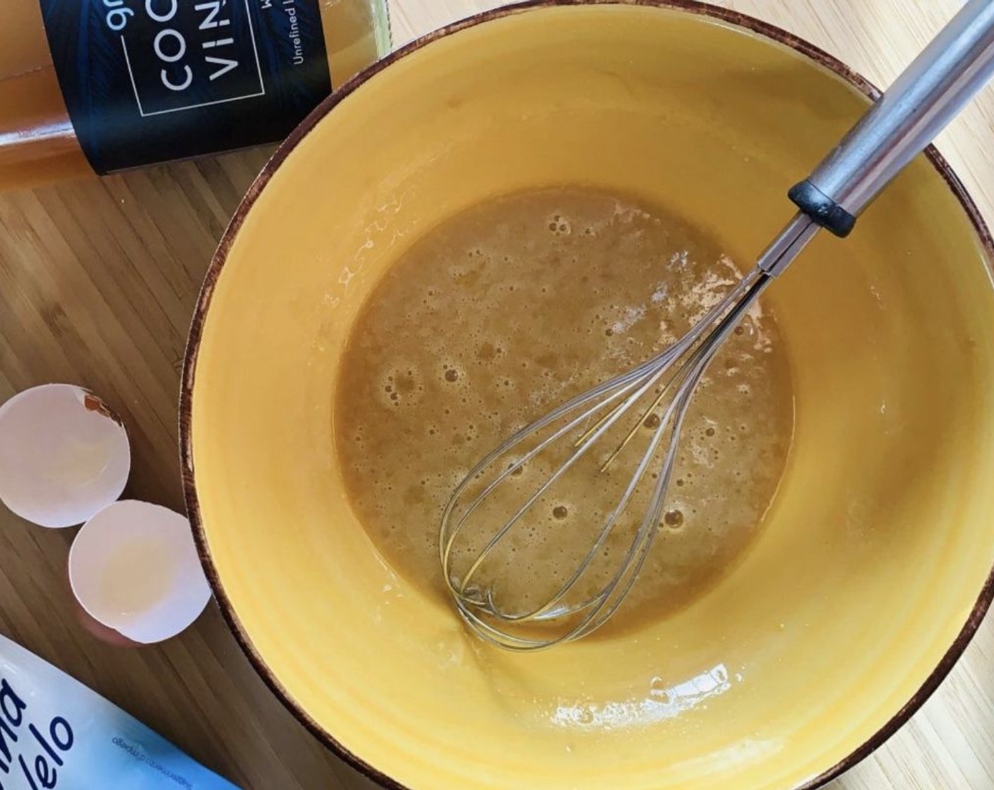 step 1 In a bowl, whisk together the Egg (1), Coconut Oil (2 oz), Coconut Vinegar (1 Tbsp), and Brown Sugar (1/4 cup).