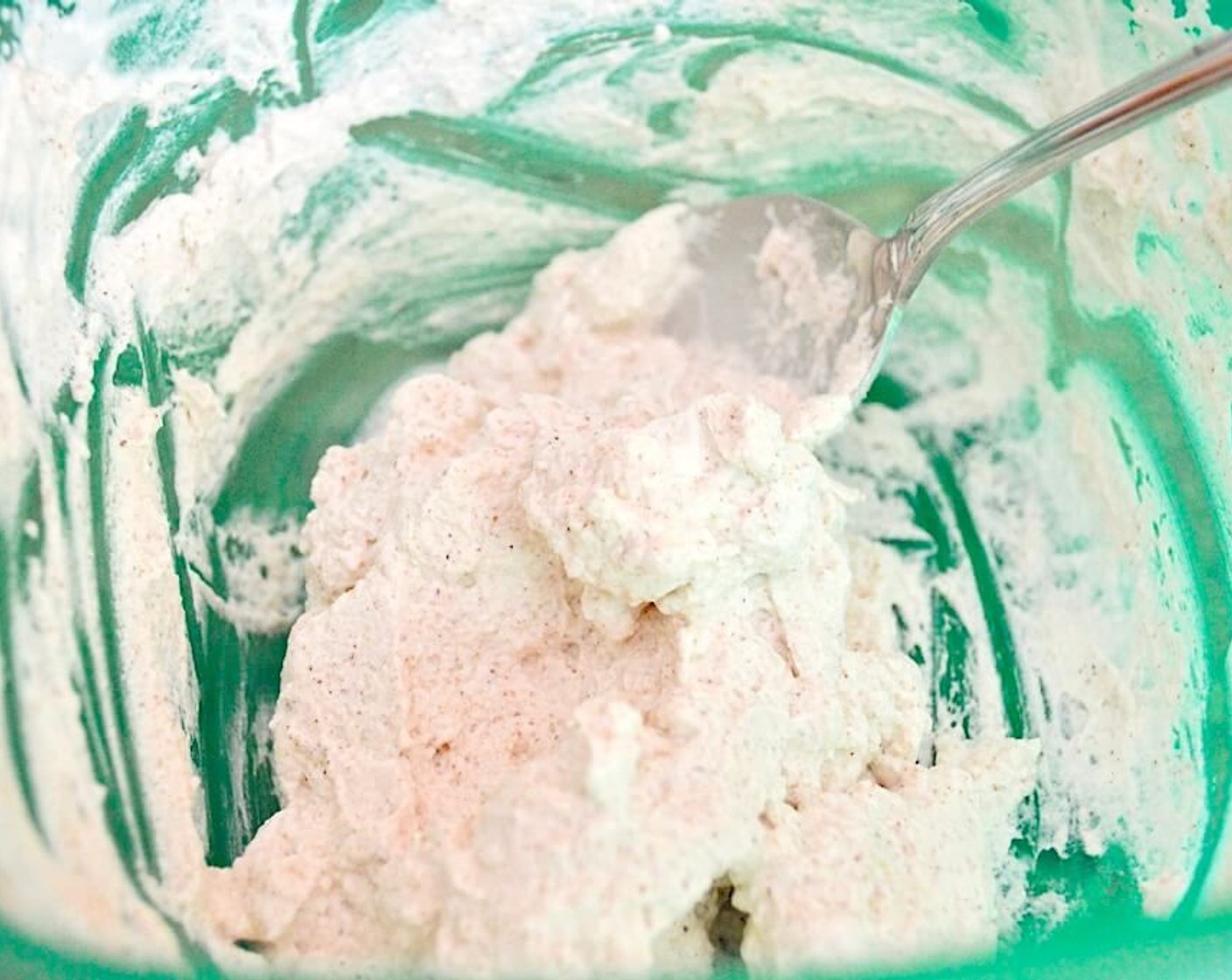 step 4 While they cook, make the simple whipped cream. Pour the Heavy Cream (80 mL) in a bowl and use a hand mixer to whip it up until it becomes stiff. Mix in the Powdered Confectioners Sugar (1 tsp) and Pumpkin Pie Spice (1/4 tsp) until it is thoroughly combined.