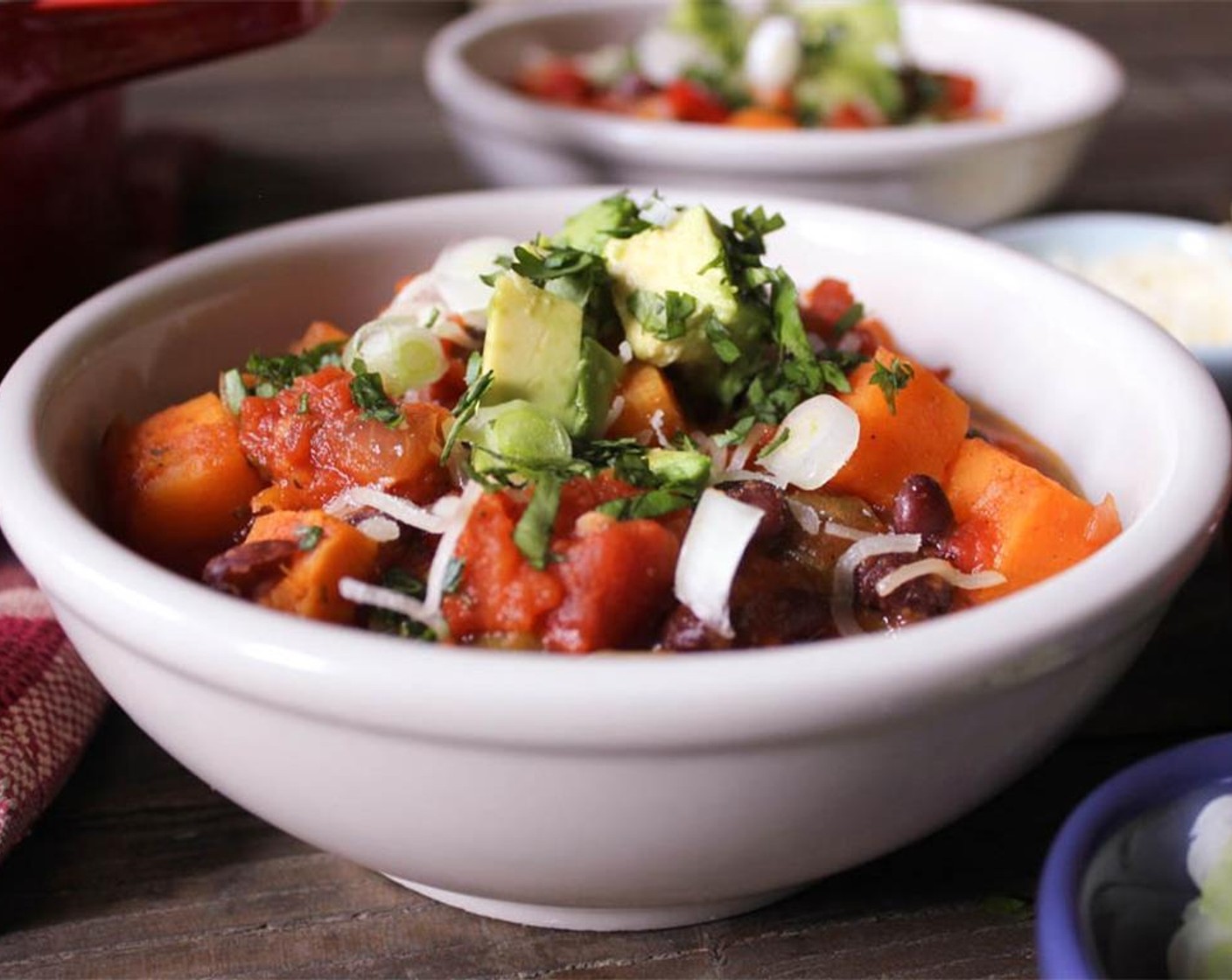 step 5 Ladle chili into bowls and serve with Fresh Cilantro (to taste), Avocados (to taste), Shredded Cheddar Cheese (to taste), and Scallions (to taste) if desired.