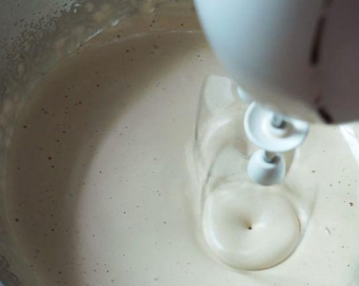 step 2 Add the Milk (1/3 cup) and mix well