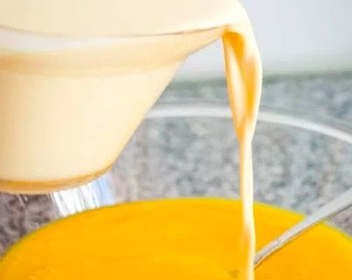 step 2 Add Evaporated Milk (1 3/4 cups) to the mango puree. Stir until well combined.