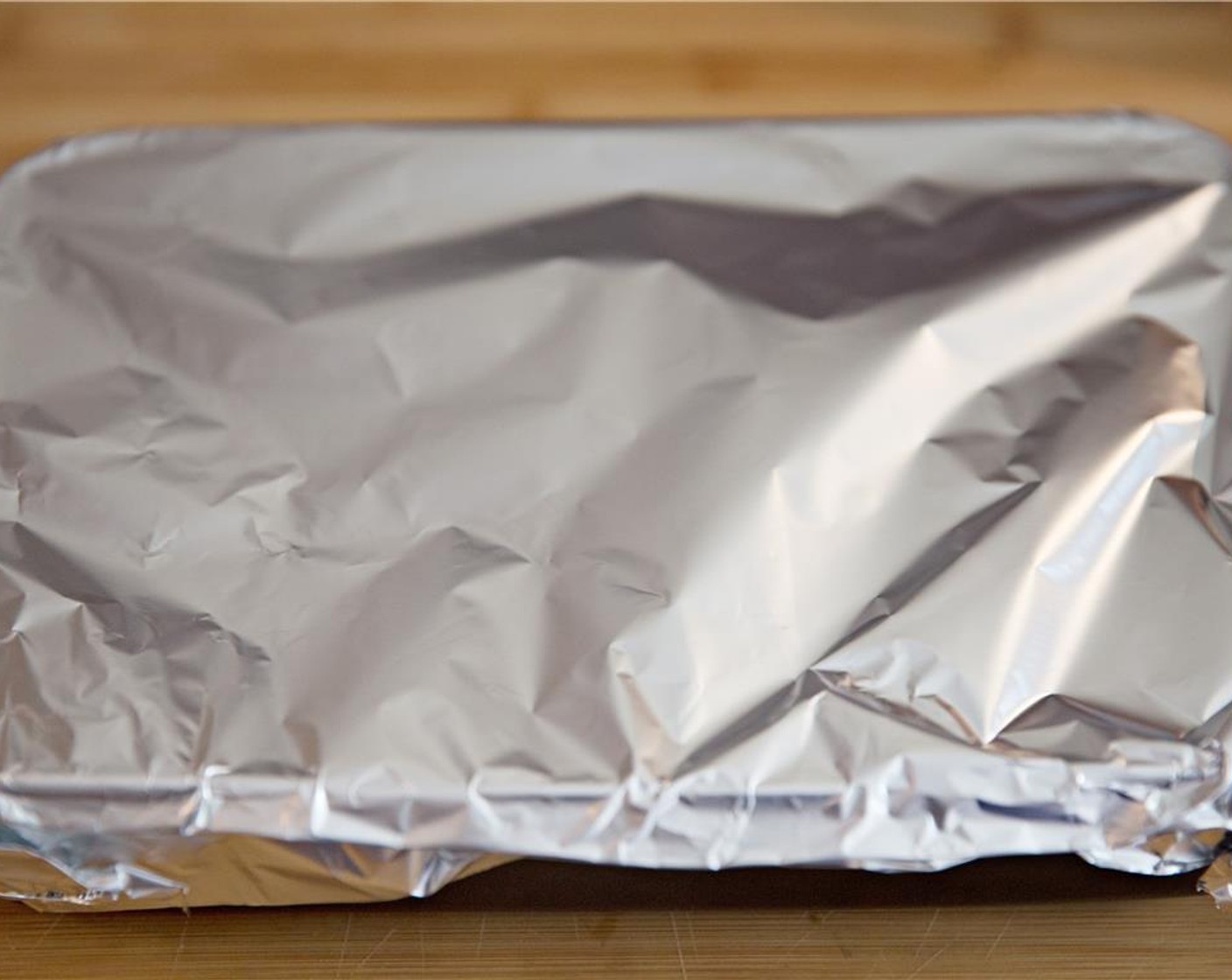 step 12 Cover tightly with aluminum foil and bake in the oven for 40 minutes.