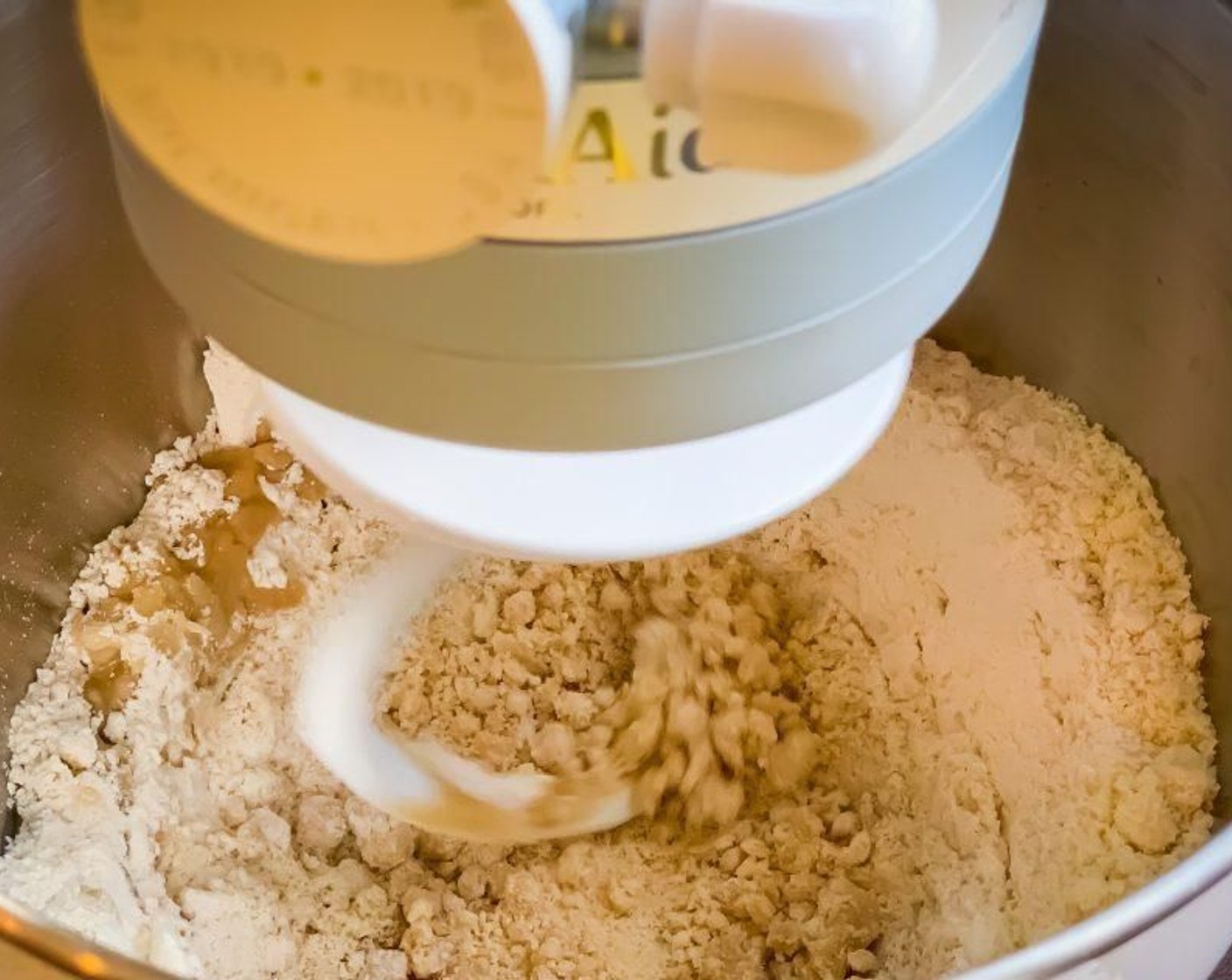 step 2 Mix well. Alternatively, use stand mixer with the dough hook and mix at the lowest speed.
