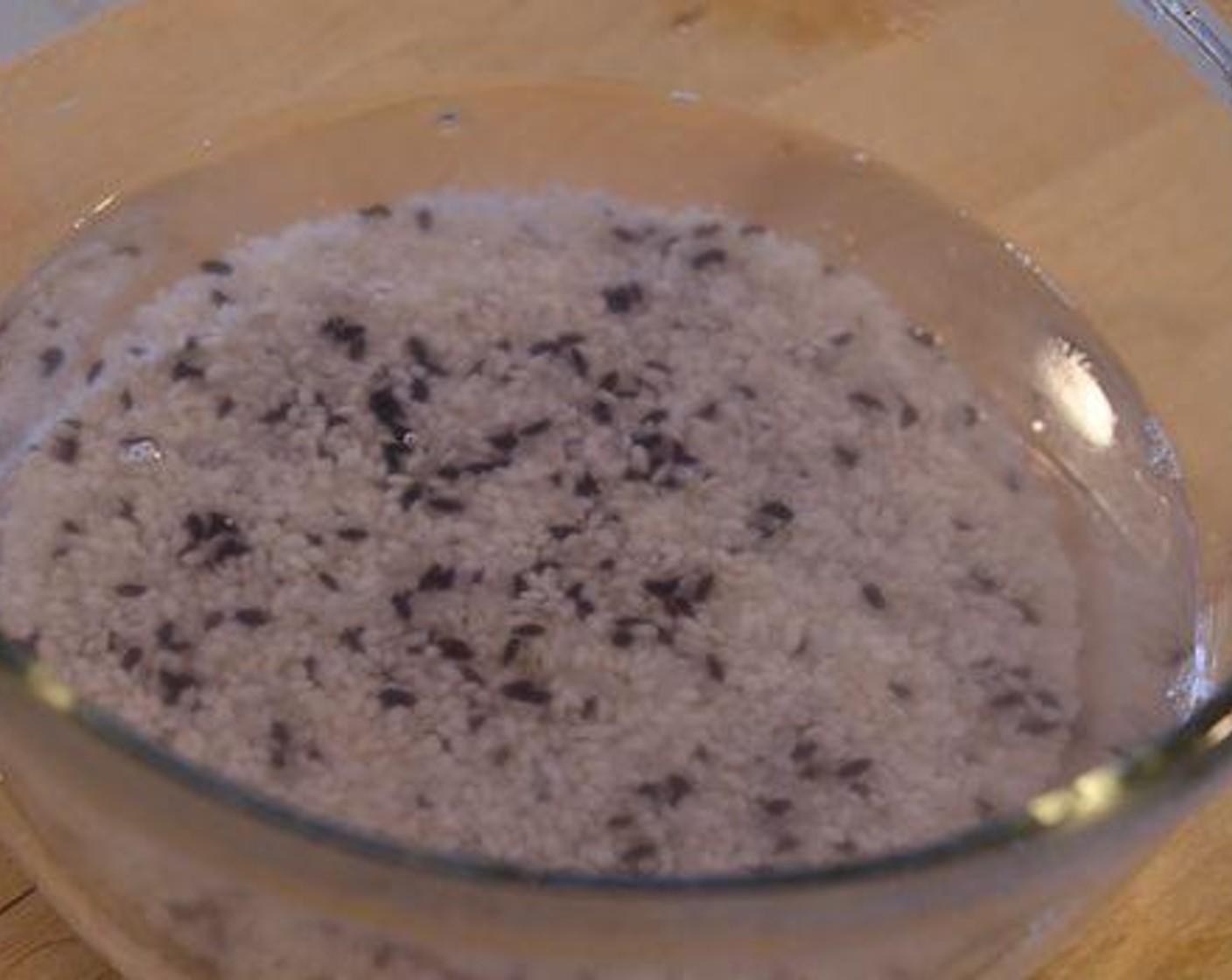 step 1 Soak Black Beans (1/3 cup) in water for 1 hour. Combine Short Grain White Rice (1 1/2 cups), Glutinous Rice (1/2 cup), Black Rice (2 Tbsp), and rinse them until the water gets clear, then soak in the water for 1 hour as well. Drain the water and combine rices and beans in the rice cooker.