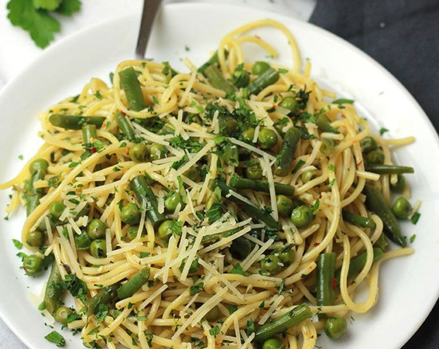 step 6 Toss veggies and pasta together in a large bowl. Taste, then add more salt as needed. Sprinkle with Crushed Red Pepper Flakes (1/4 tsp) and toss once more. Garnish Shredded Parmesan Cheese (to taste). Serve while hot and enjoy!