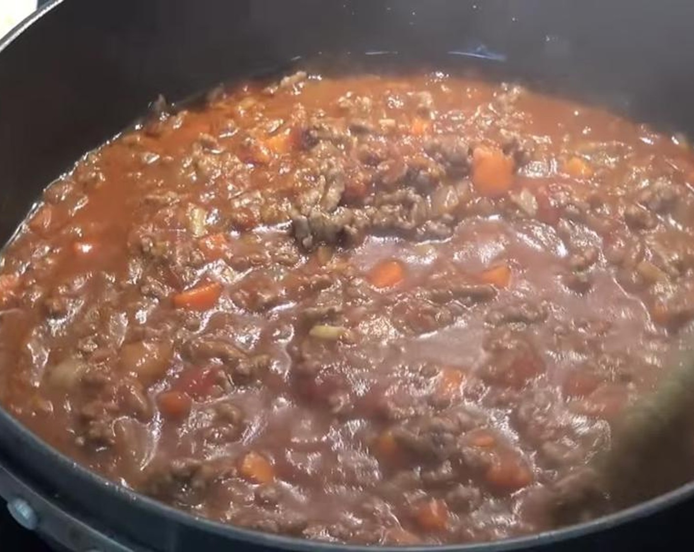 step 4 Add Tomato Paste (1/4 cup), Canned Diced Tomatoes (1 3/4 cups), and Beef Stock (1 cup). Stir together, slightly reduce the heat, and allow to simmer for about 20 minutes or until the mixture has slightly thickened up.