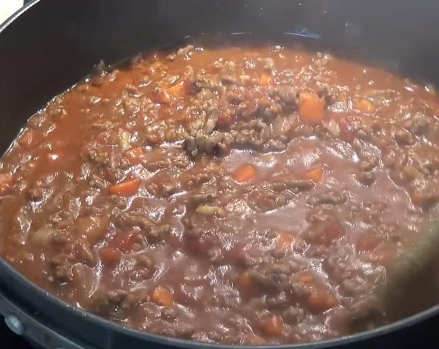 step 4 Add Tomato Paste (4 Tbsp), Canned Diced Tomatoes (1 3/4 cups), and Beef Stock (1 cup). Stir together, slightly reduce the heat, and allow to simmer for about 20 minutes or until the mixture has slightly thickened up.