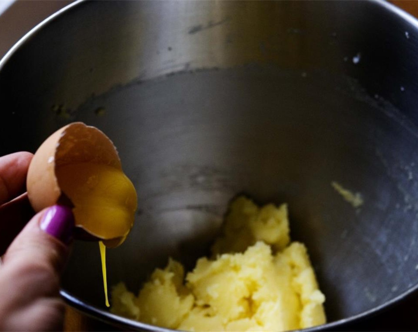 step 3 Add in the Egg (1) Yolk and stir until combined.