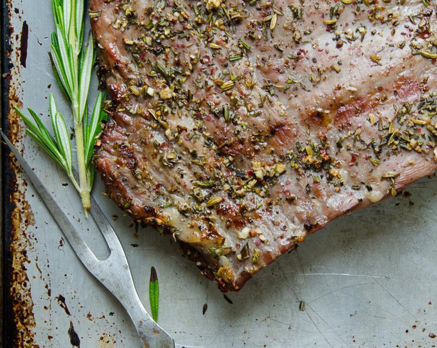 step 8 Transfer steak to a clean cutting board, and tent with tin foil for 7 to 8 minutes to rest.