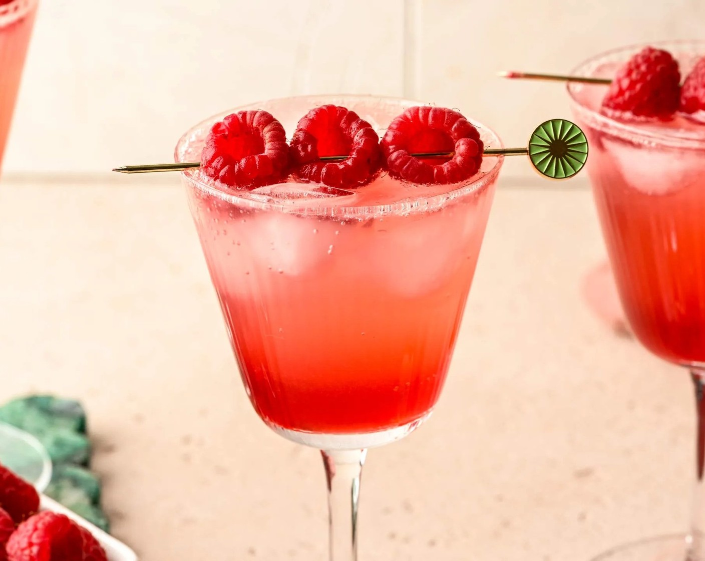 step 4 To make one drink, fill a cocktail glass with ice and add one ounce raspberry simple syrup and one-half ounce Lemon Juice (2 fl oz). Stir gently, then top off with Club Soda (to taste) and garnish with Fresh Raspberries (to taste). Enjoy!