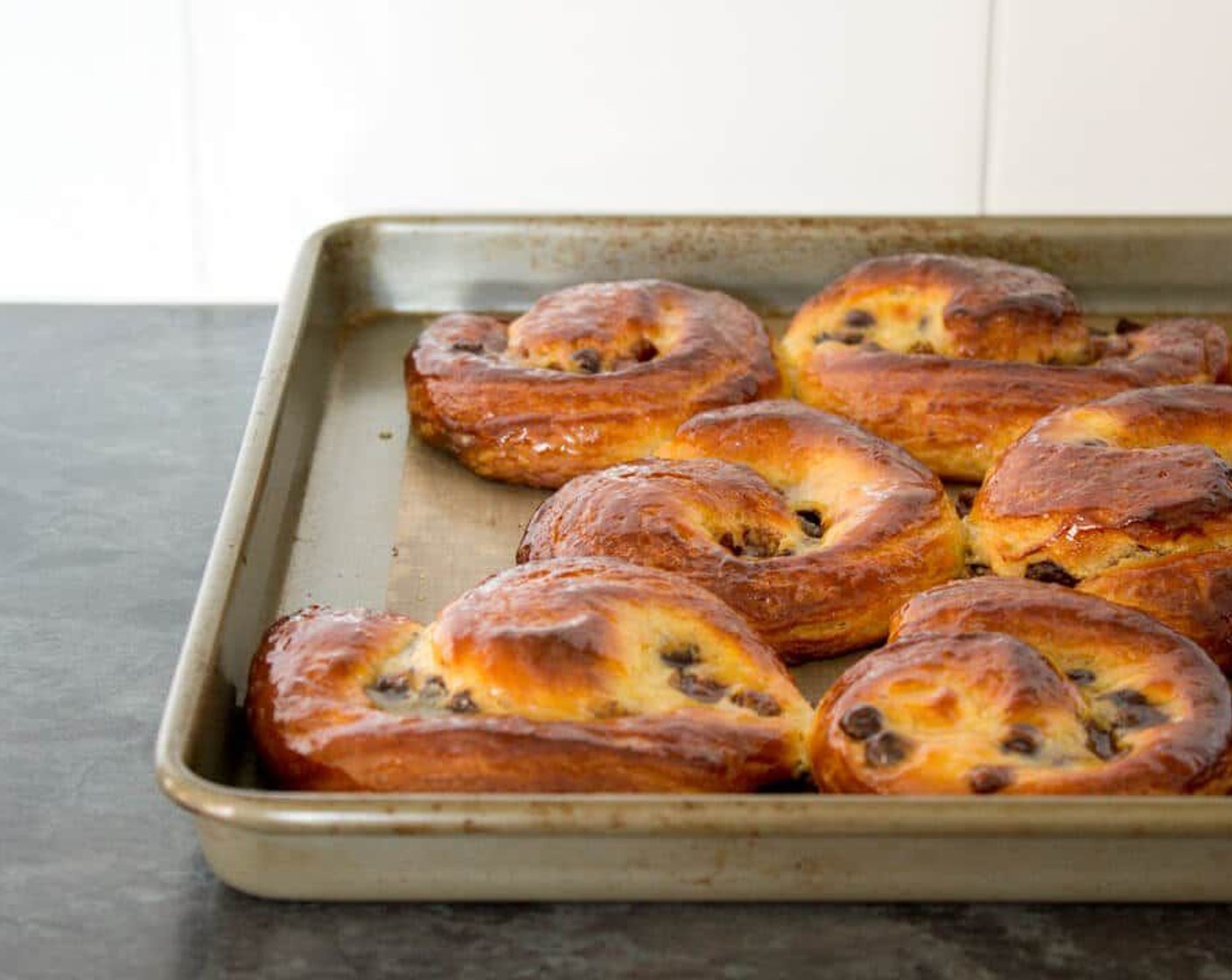 step 29 As soon as the pastries are out the oven, brush them all over with the glaze and allow to cool.