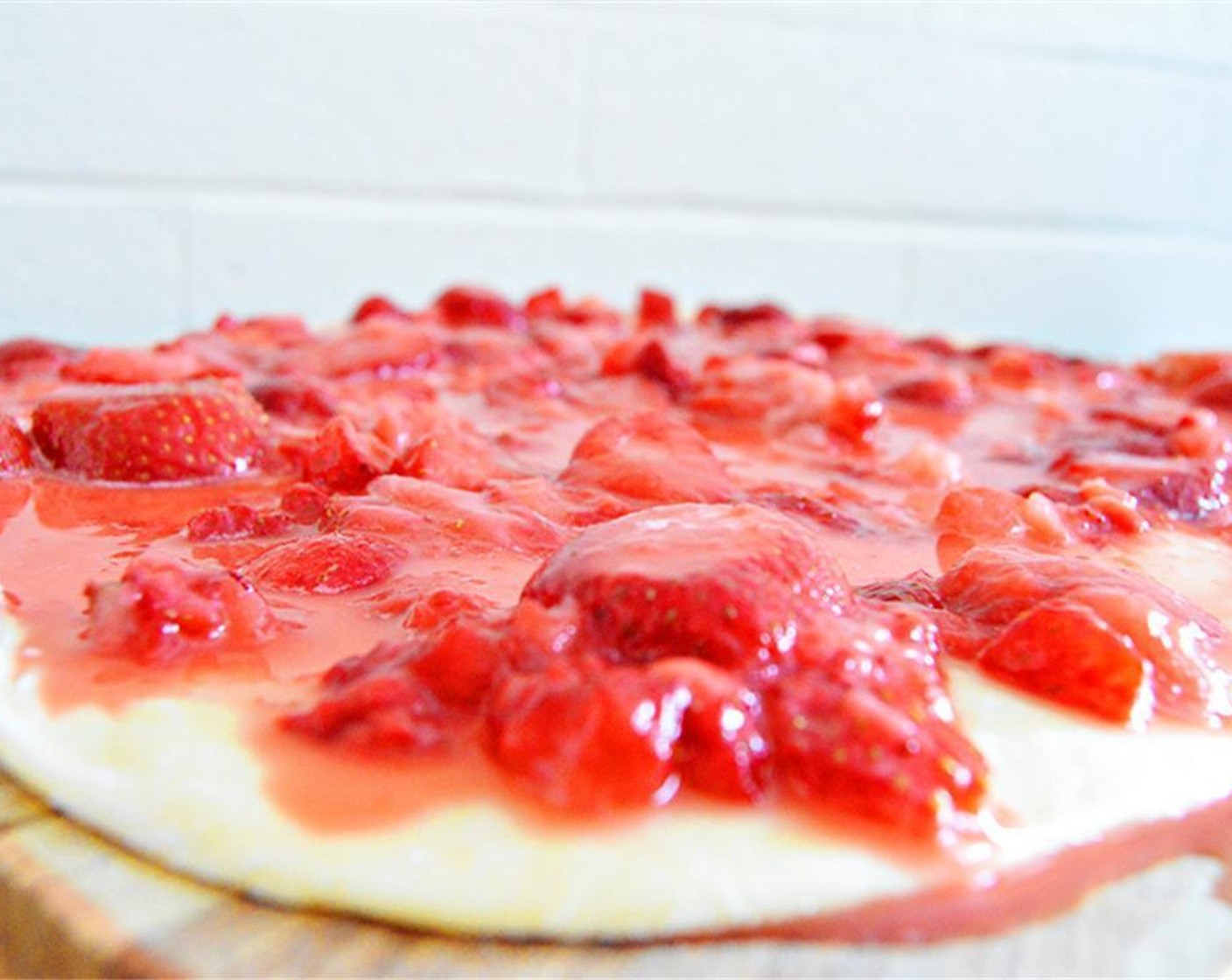 step 4 Punch the dough down, then roll it into a rectangle. Mix together filling ingredients, Fresh Strawberries (4 cups), Granulated Sugar (1/2 cup), Lemon (1), and Corn Starch (2 Tbsp). Spread over dough.